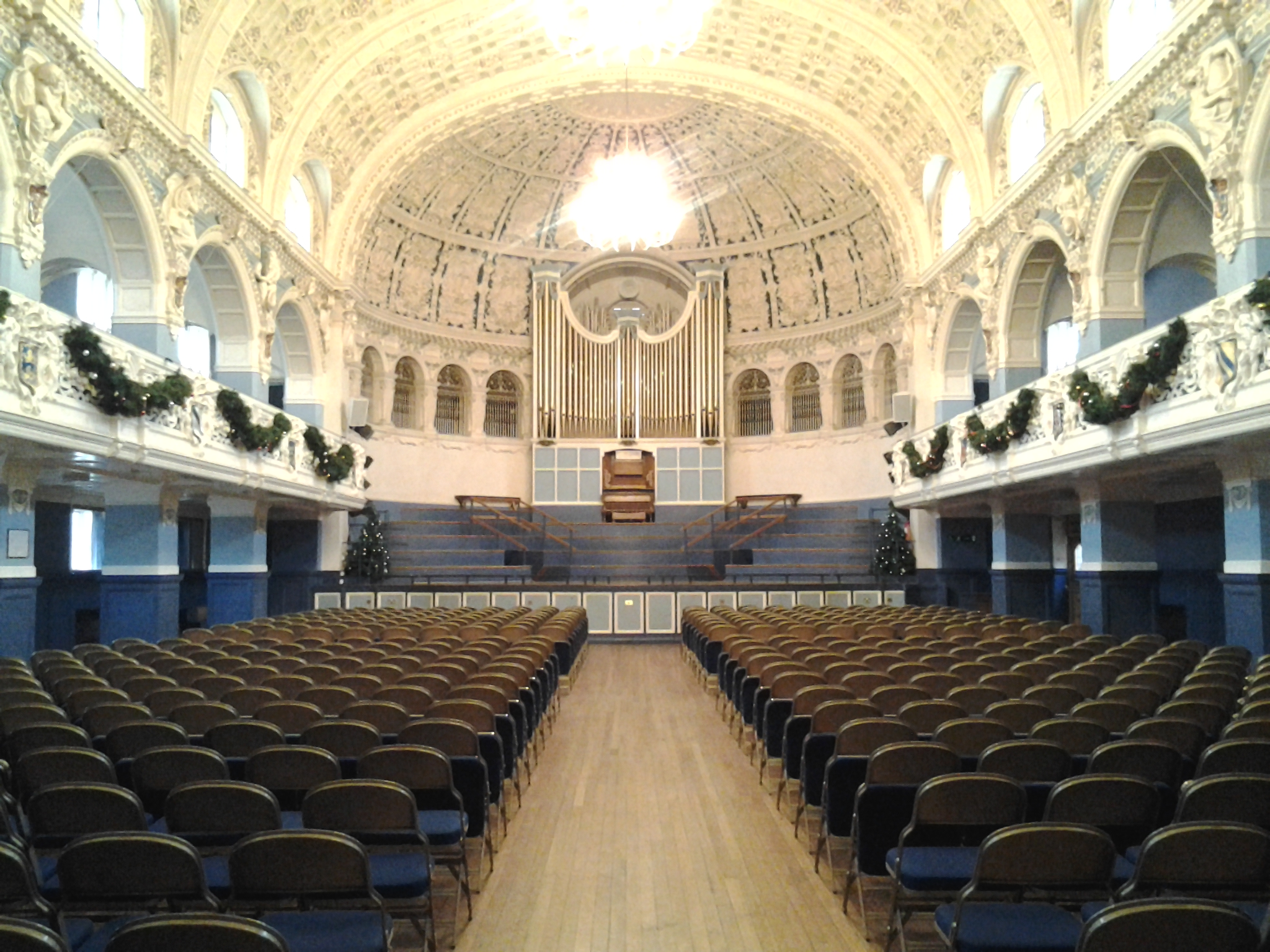 Main Hall in Oxford Town Hall: elegant venue for conferences and performances with high ceilings.