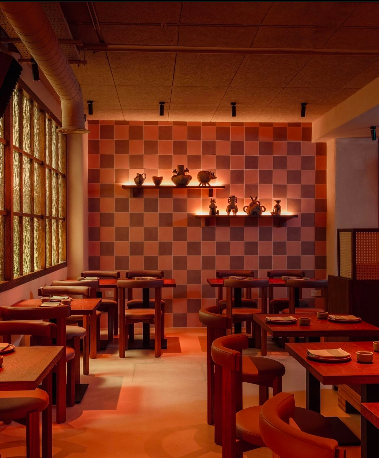 Cozy Sala Rosa restaurant interior ideal for private events and networking dinners.