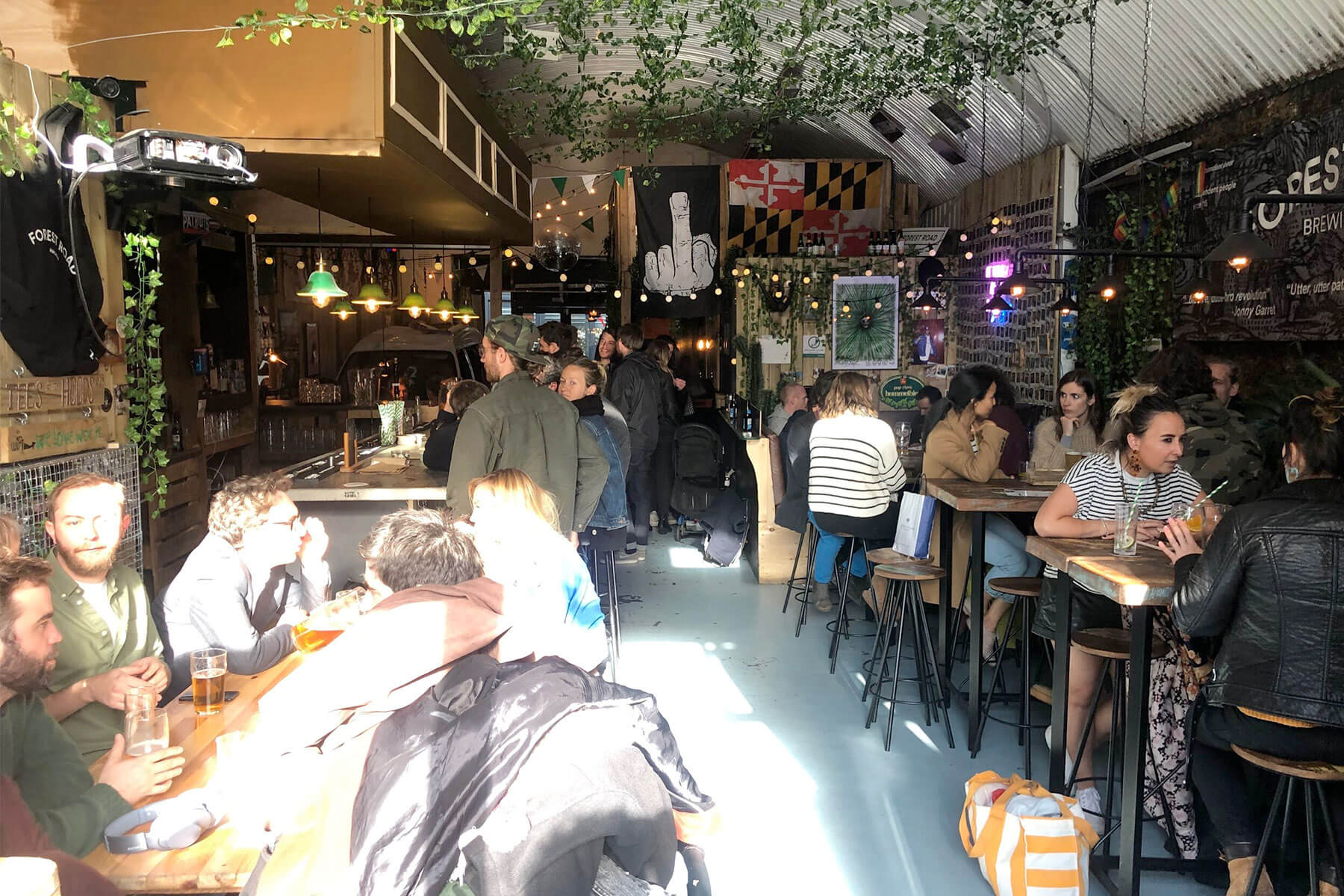 Lively Brewery Taproom with vibrant decor, ideal for social gatherings and networking events.
