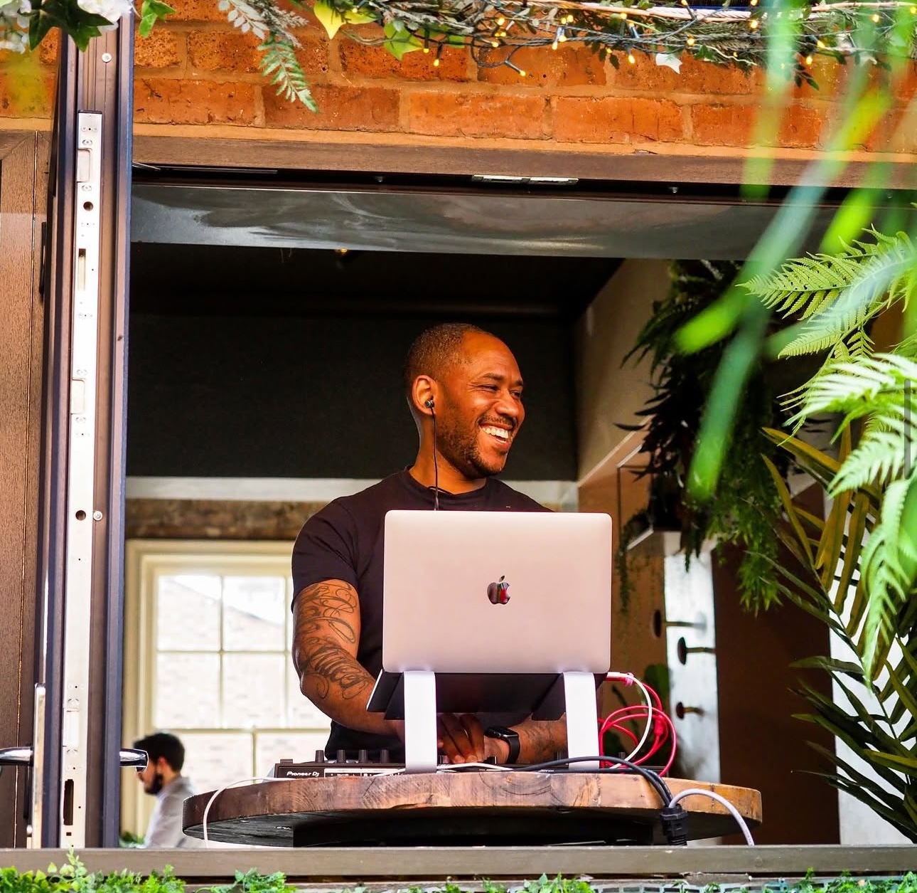 Dynamic speaker at Eden Cocktail Bar, modern venue for inspiring events and presentations.