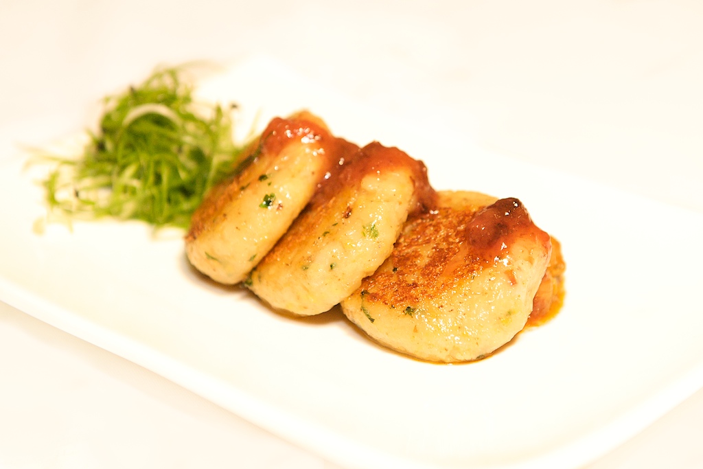 Upscale dumplings with green onion at Mezzanine Bar, Mint Leaf Lounge catering event.