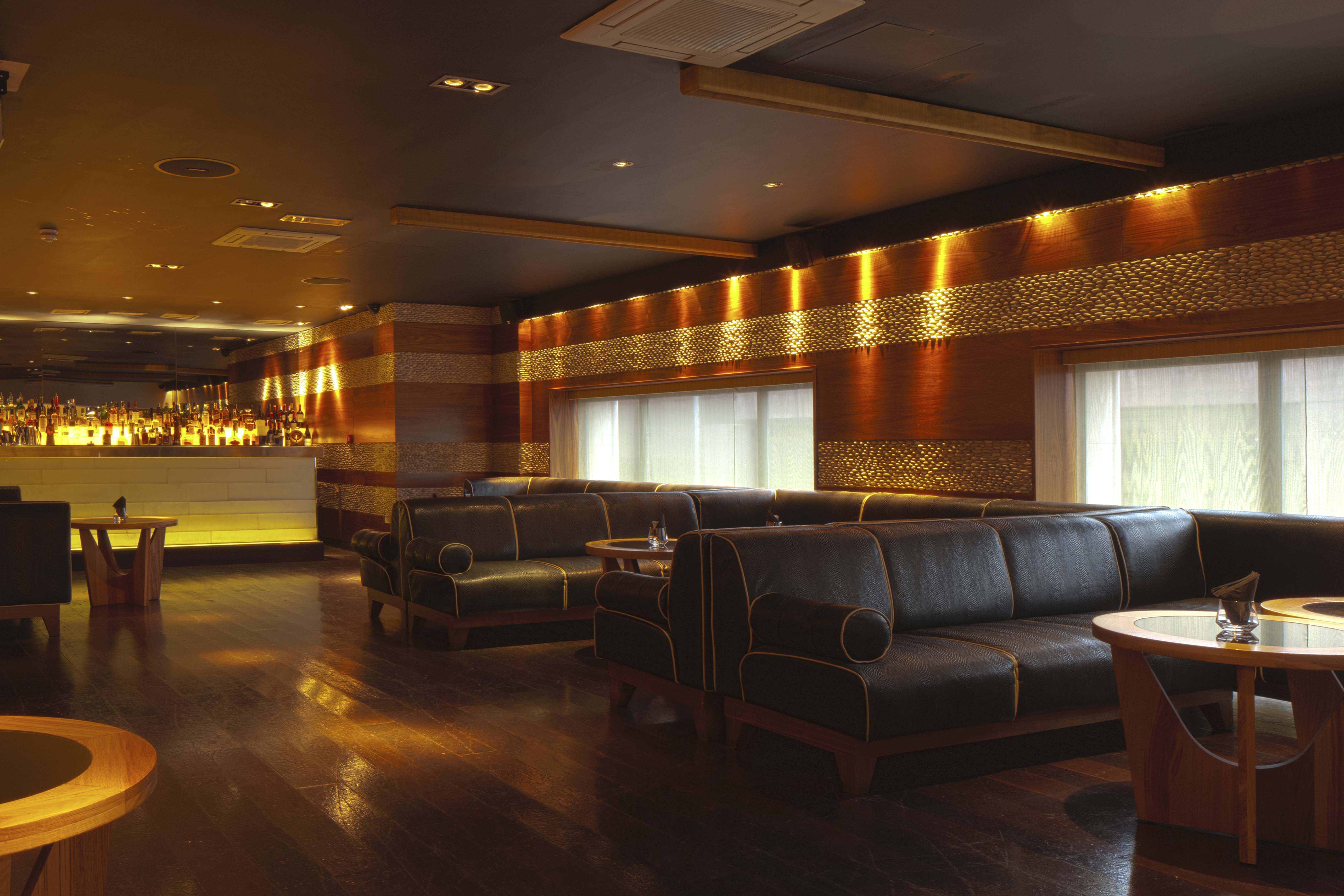 Stylish lounge at Mezzanine Bar, ideal for networking events and intimate meetings.
