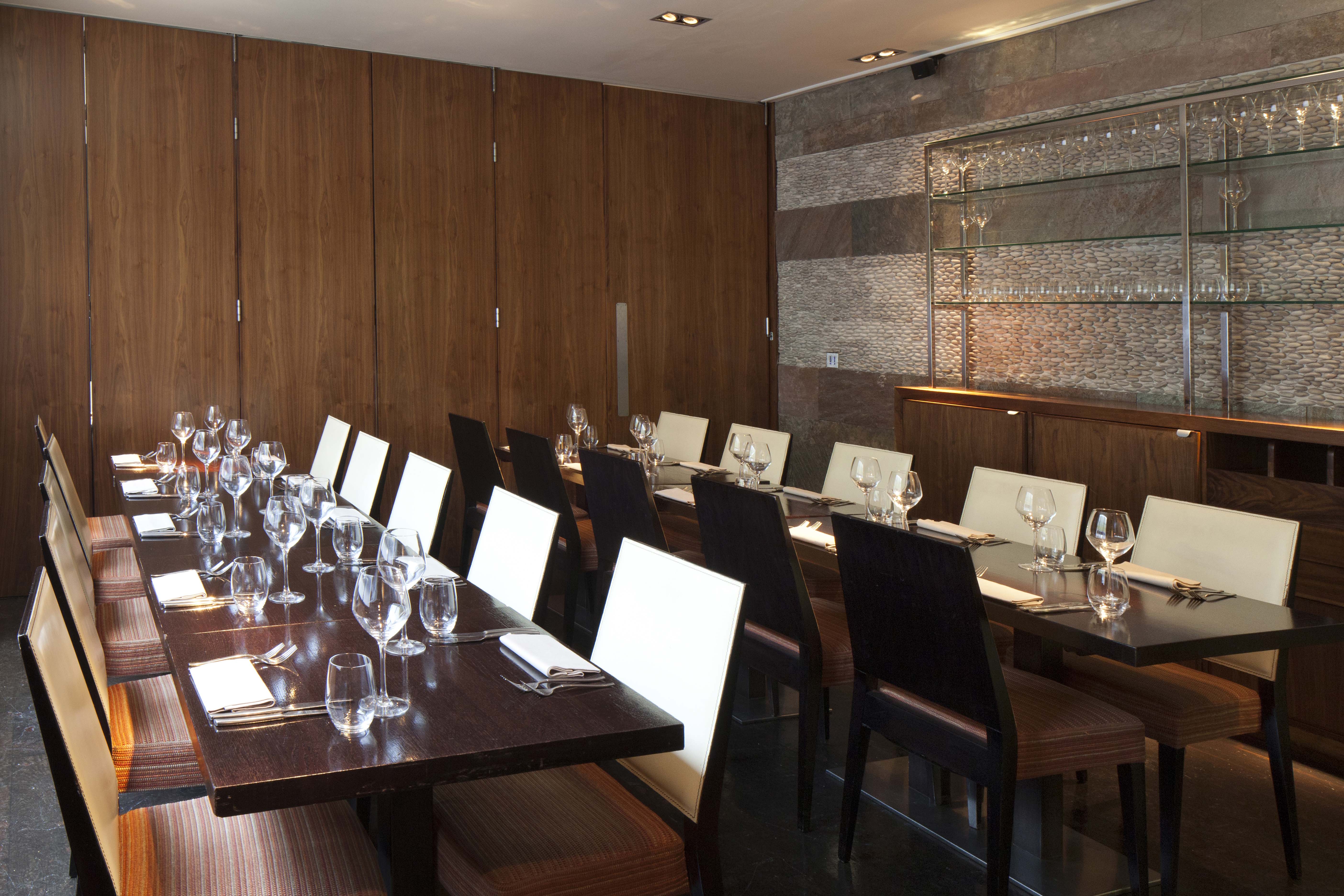 Private dining room at Mint Leaf Lounge with elegant table setup for intimate events.