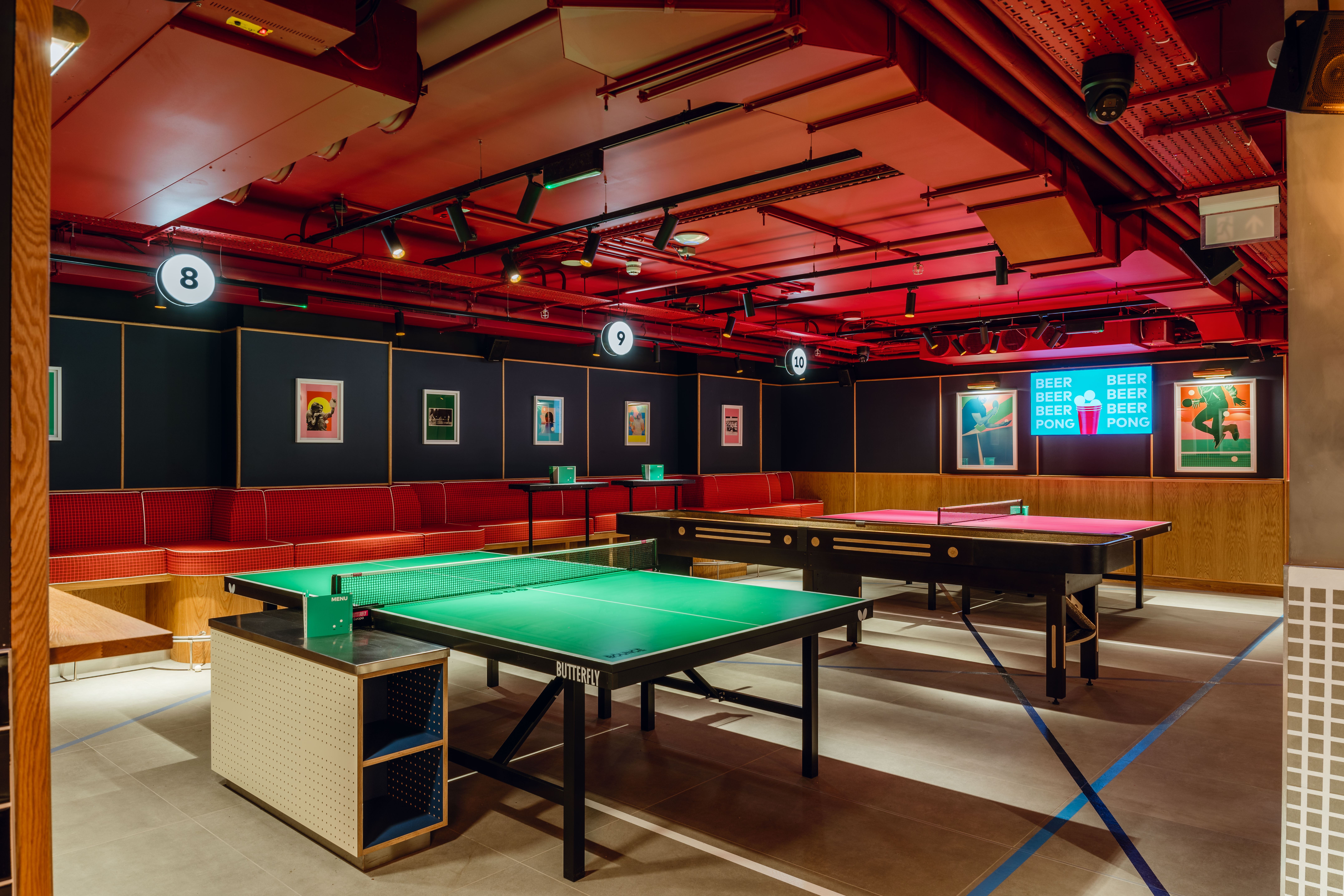 Modern event space with ping pong tables at Bounce Battersea for corporate gatherings.