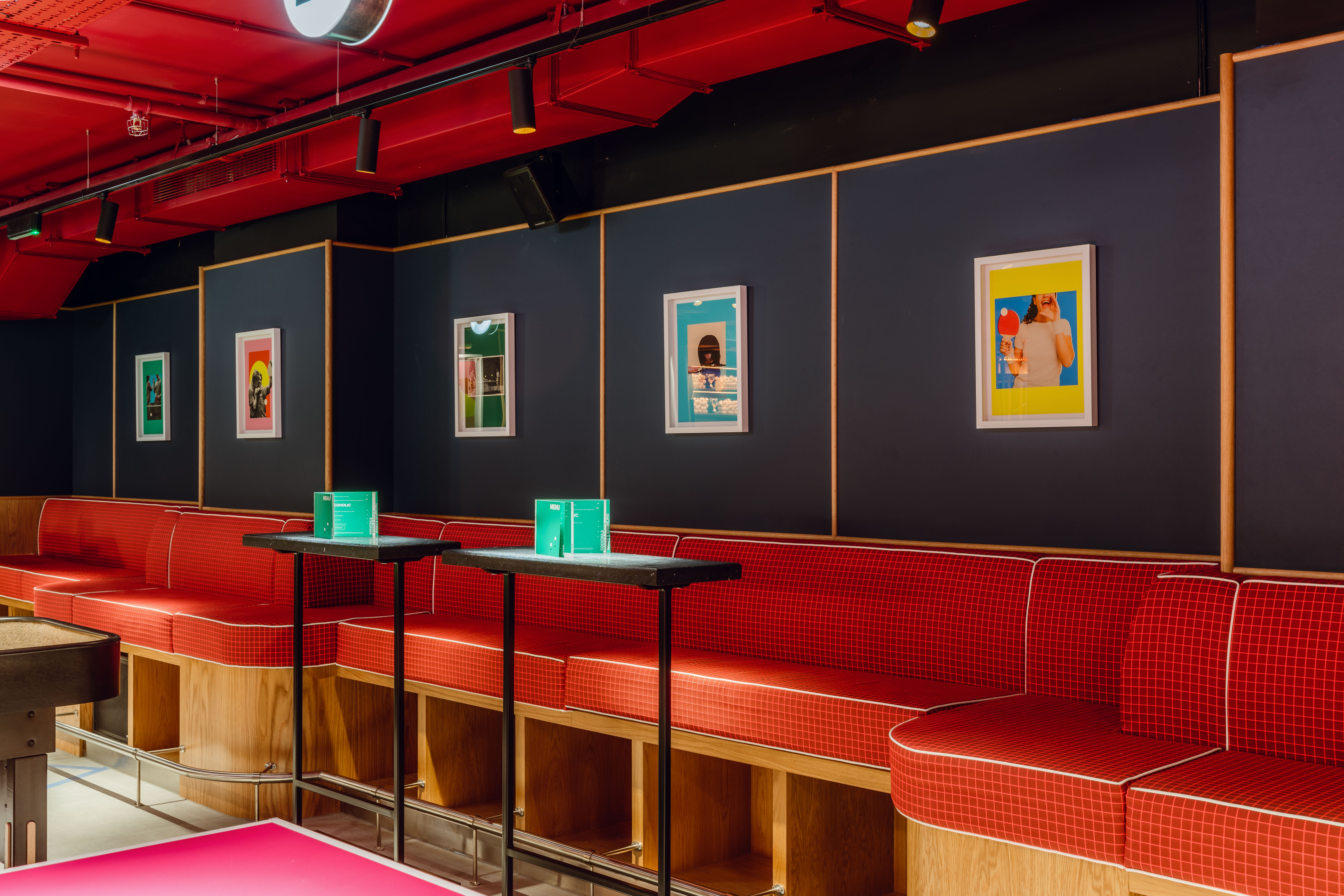 Vibrant event space at Bounce Battersea with stylish seating and colorful artwork.