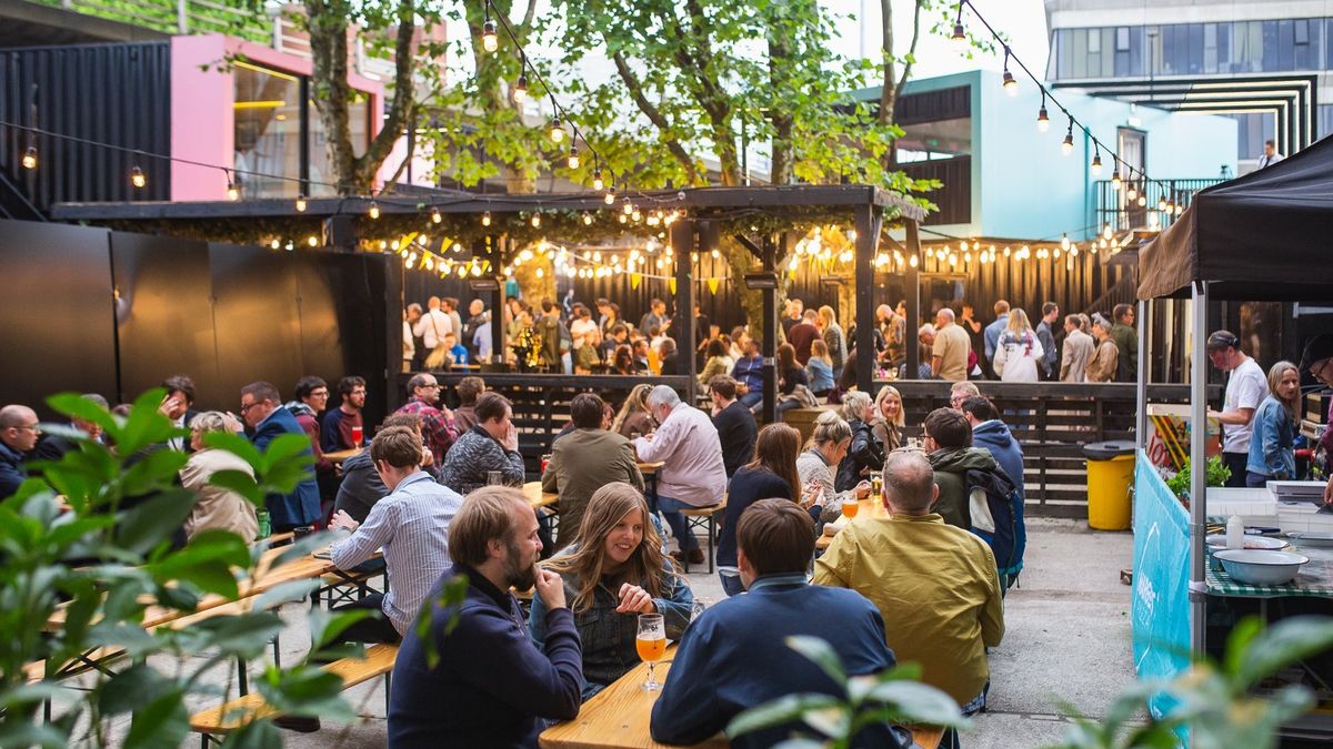 Patio at Quarter House: vibrant outdoor event space with communal seating for networking.