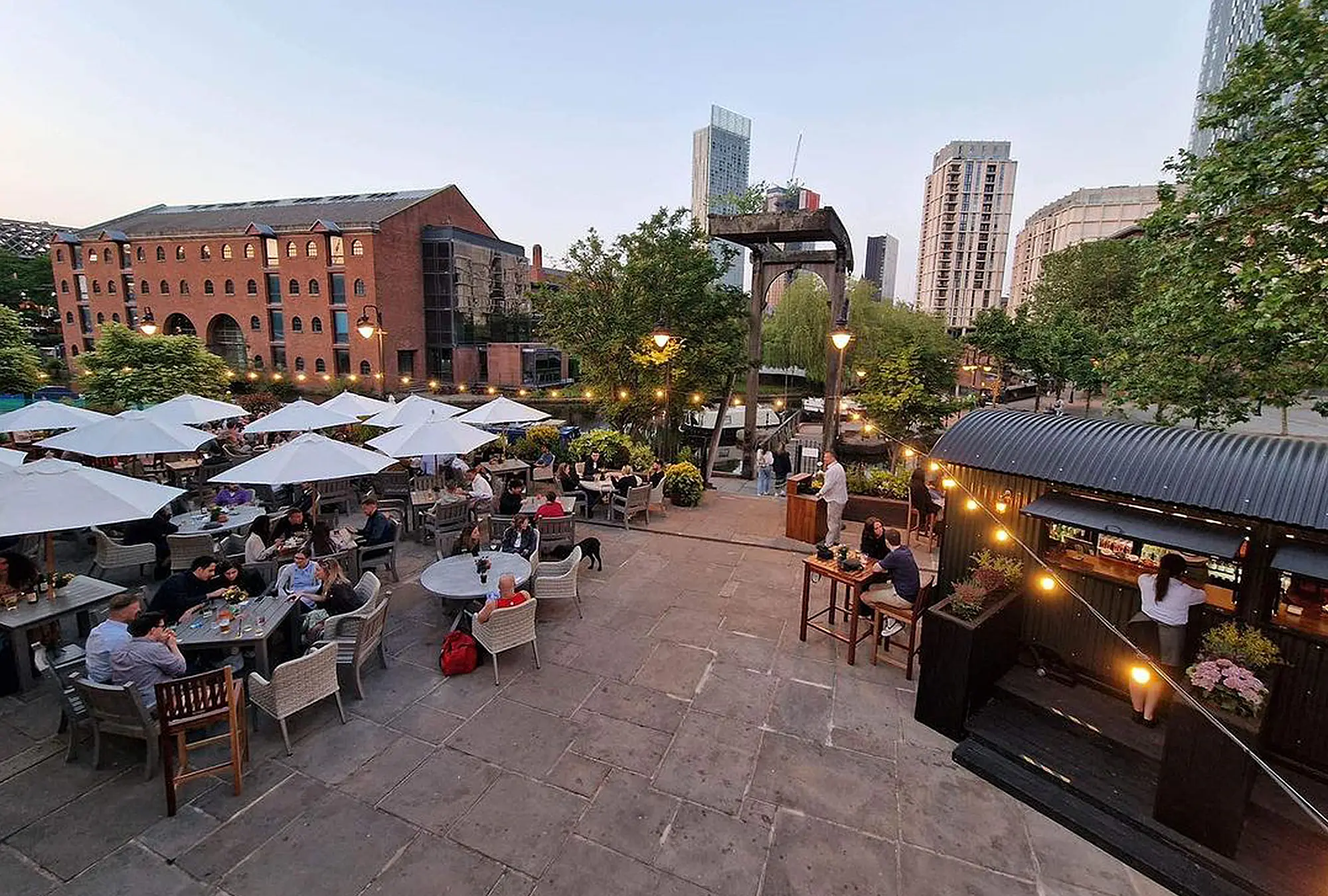 Vibrant beer garden at Quarter House, perfect for social events and networking.