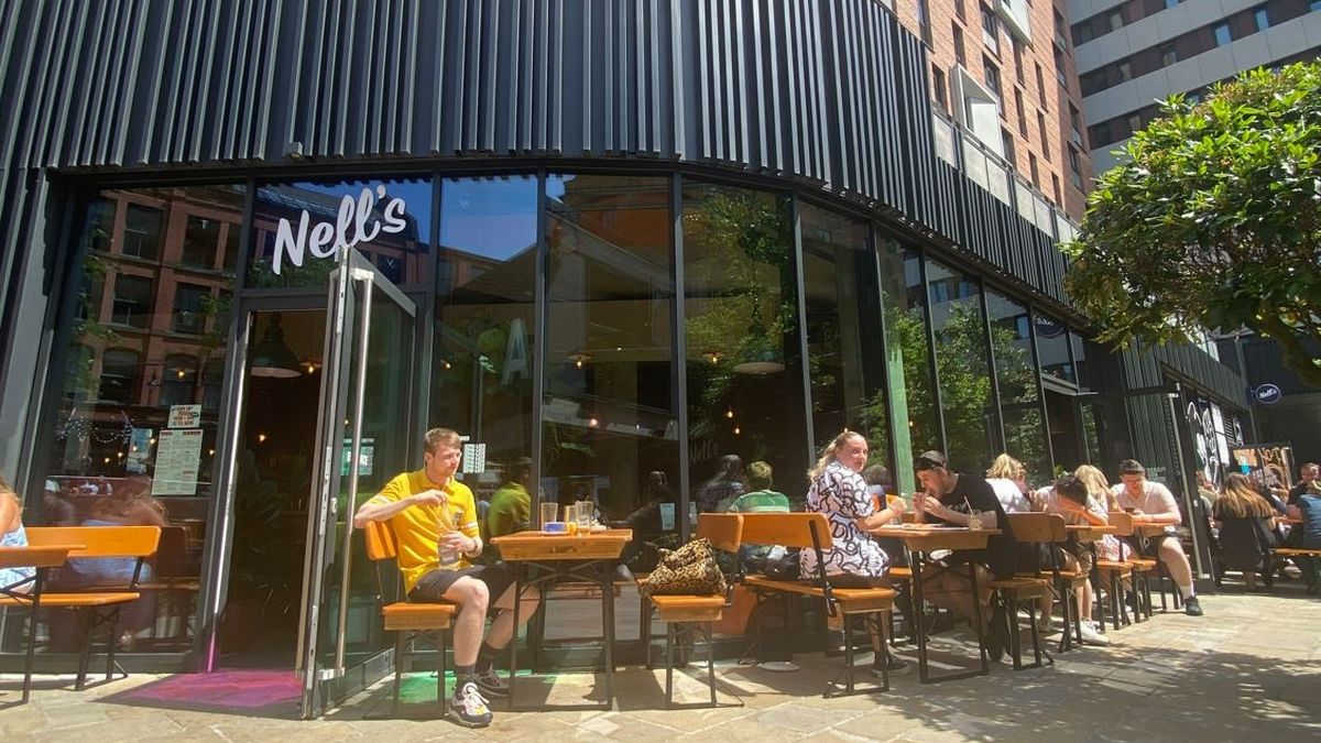 Vibrant outdoor café at Nell's Kampus, ideal for networking events and team-building activities.