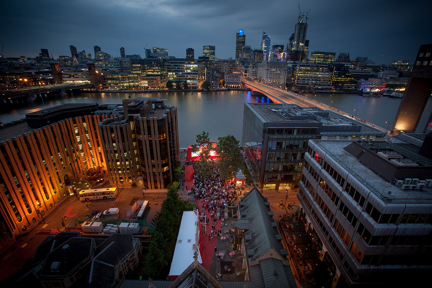 Millennium Courtyard at Southwark Cathedral, vibrant networking event with red carpet.