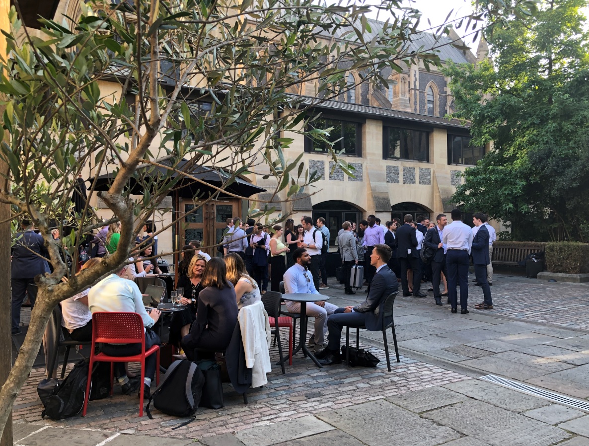 Vibrant outdoor networking event at Millennium Courtyard, Southwark Cathedral.