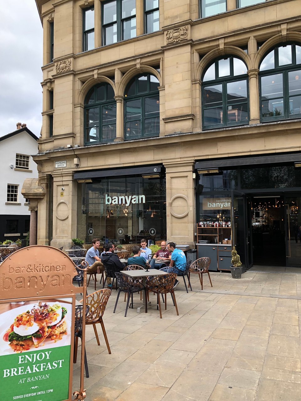 Banyan Bar & Kitchen outdoor dining area, perfect for casual meetings and networking events.