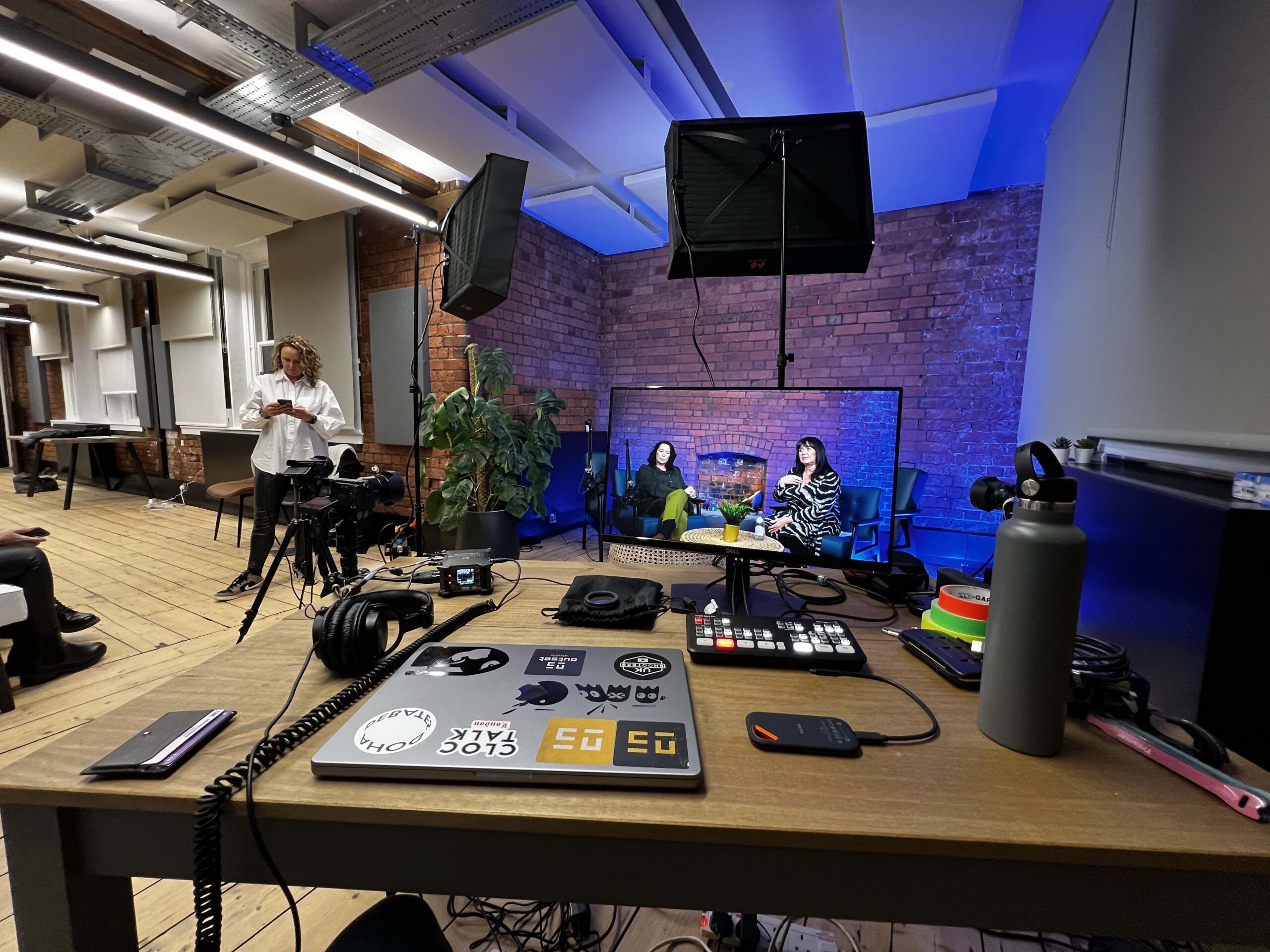 Modern recording studio setup for hybrid meetings and live streaming events.