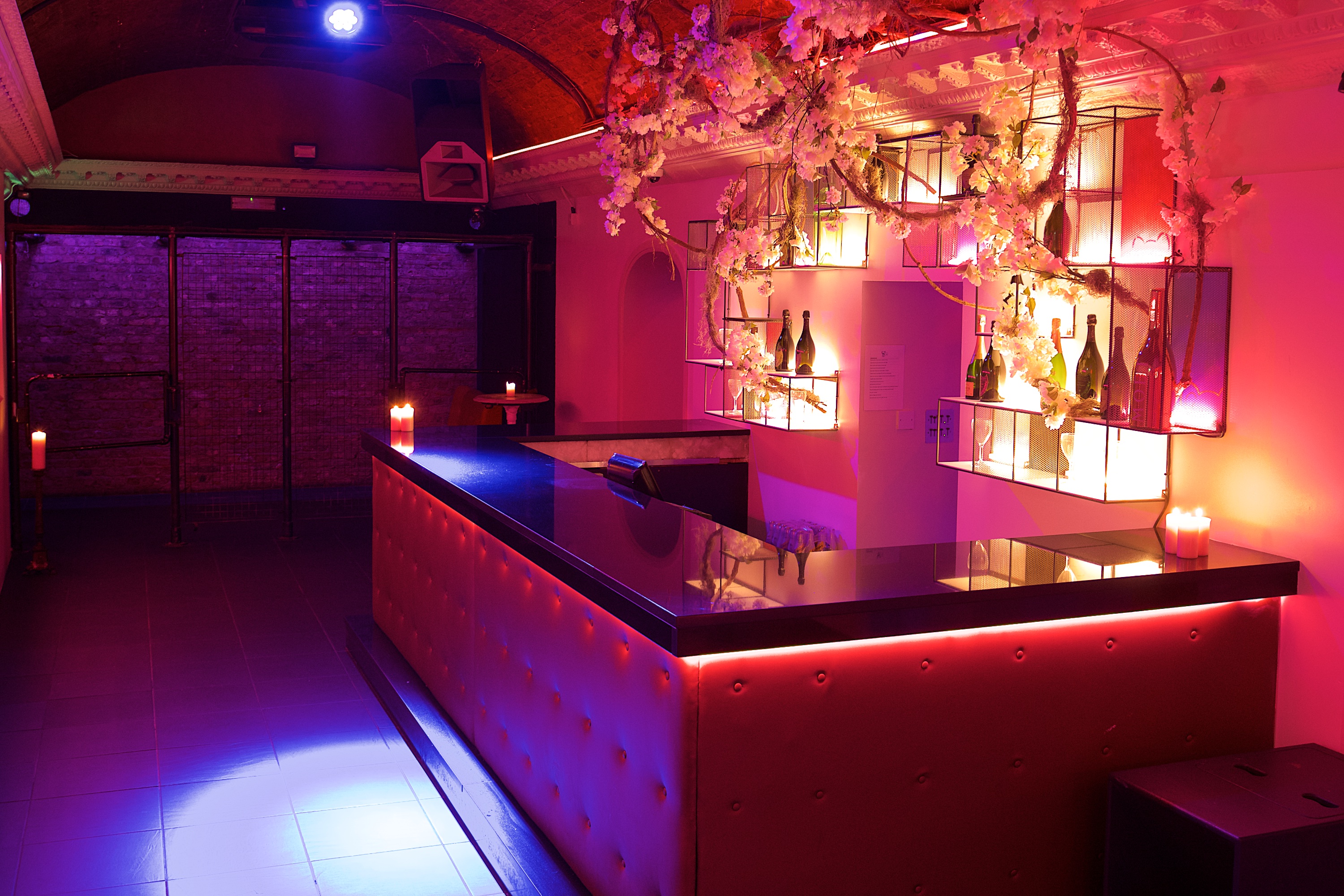 Stylish TOY ROOM venue with vibrant bar, perfect for cocktail receptions and gatherings.