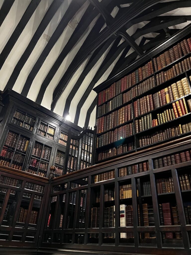 Chetham's Library with antique books, ideal for literary workshops and intimate events.