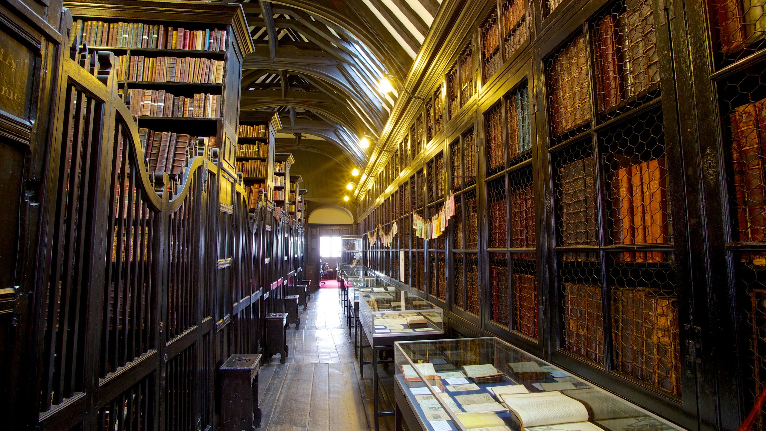 Chetham's Library with towering bookshelves, perfect for literary events and workshops.