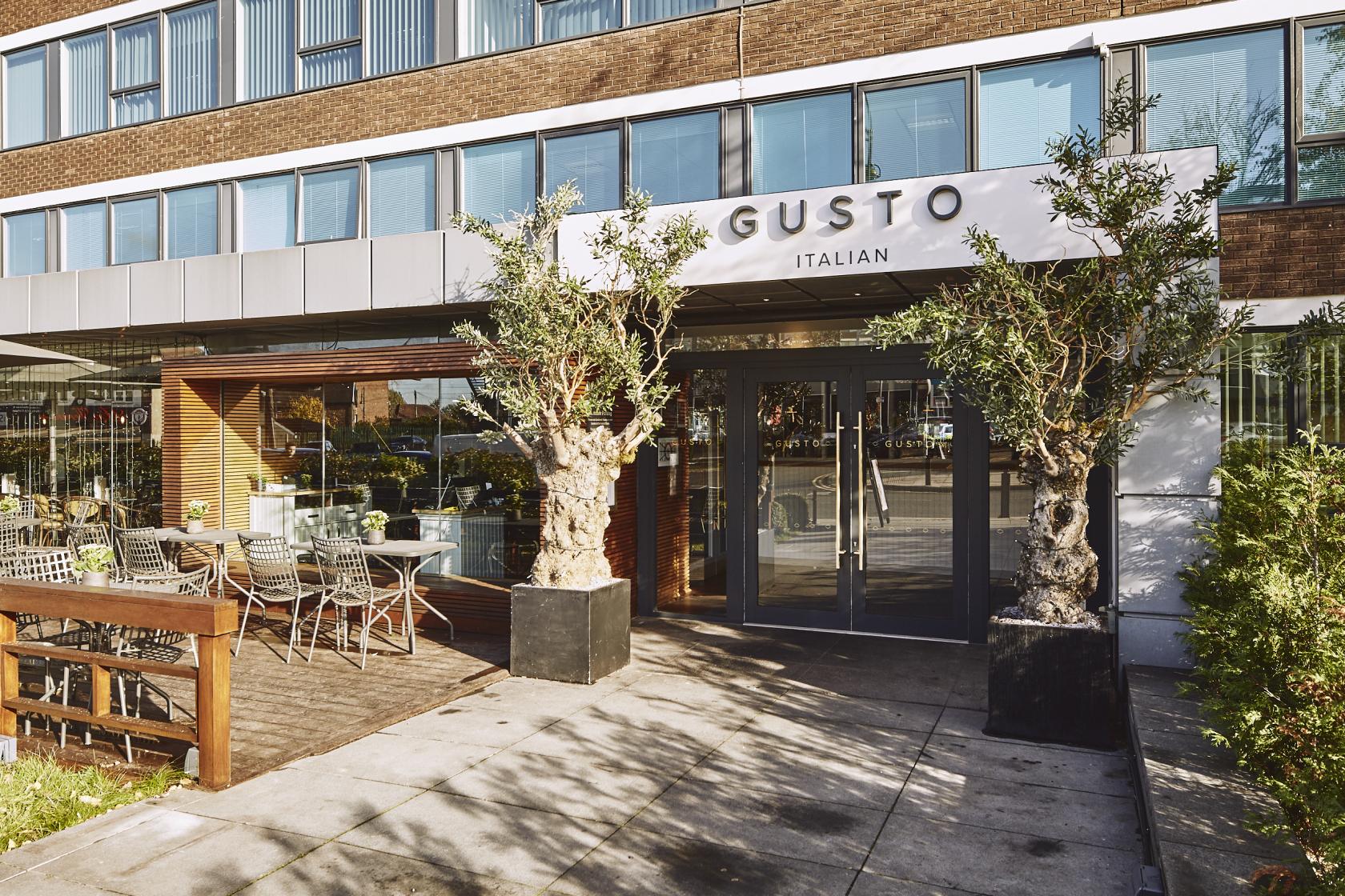 Modern restaurant entrance at Gusto Italian Cheadle Hulme, ideal for events and gatherings.