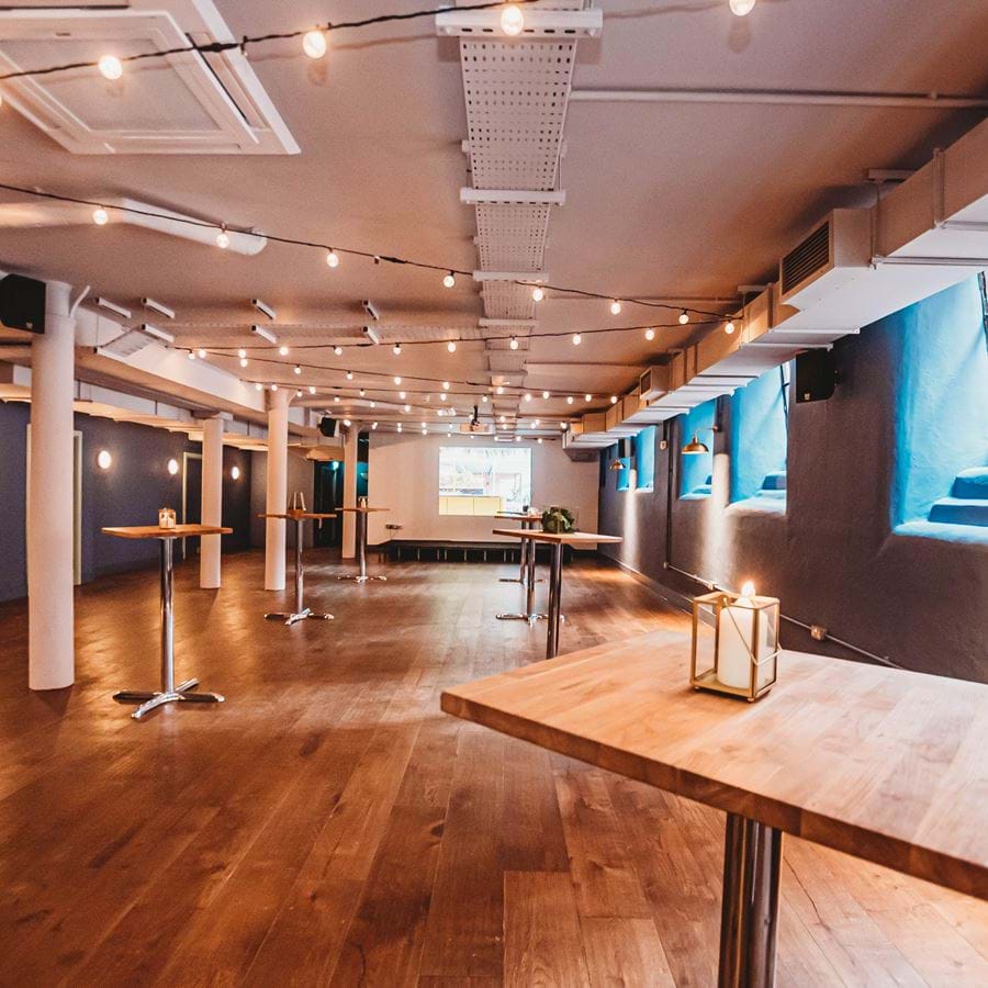 Boardroom at Whitworth Locke: modern event space with warm lighting for corporate gatherings.