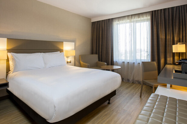 Meeting room at AC Hotel Manchester with modern design, ideal for conferences and events.