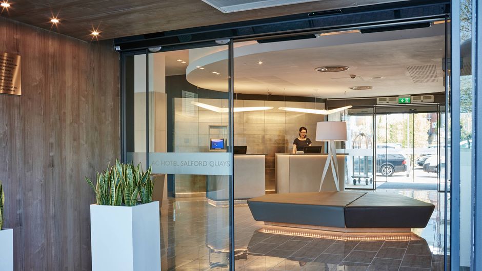 Modern conference room at AC Hotel Manchester, ideal for networking events and meetings.