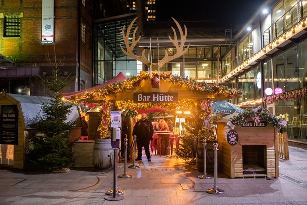 Karaoke Huts at Courts Club, festive bar with holiday decor for winter markets and celebrations.
