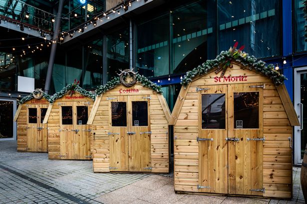 Karaoke huts at Courts Club, rustic vendor booths for festive outdoor events.
