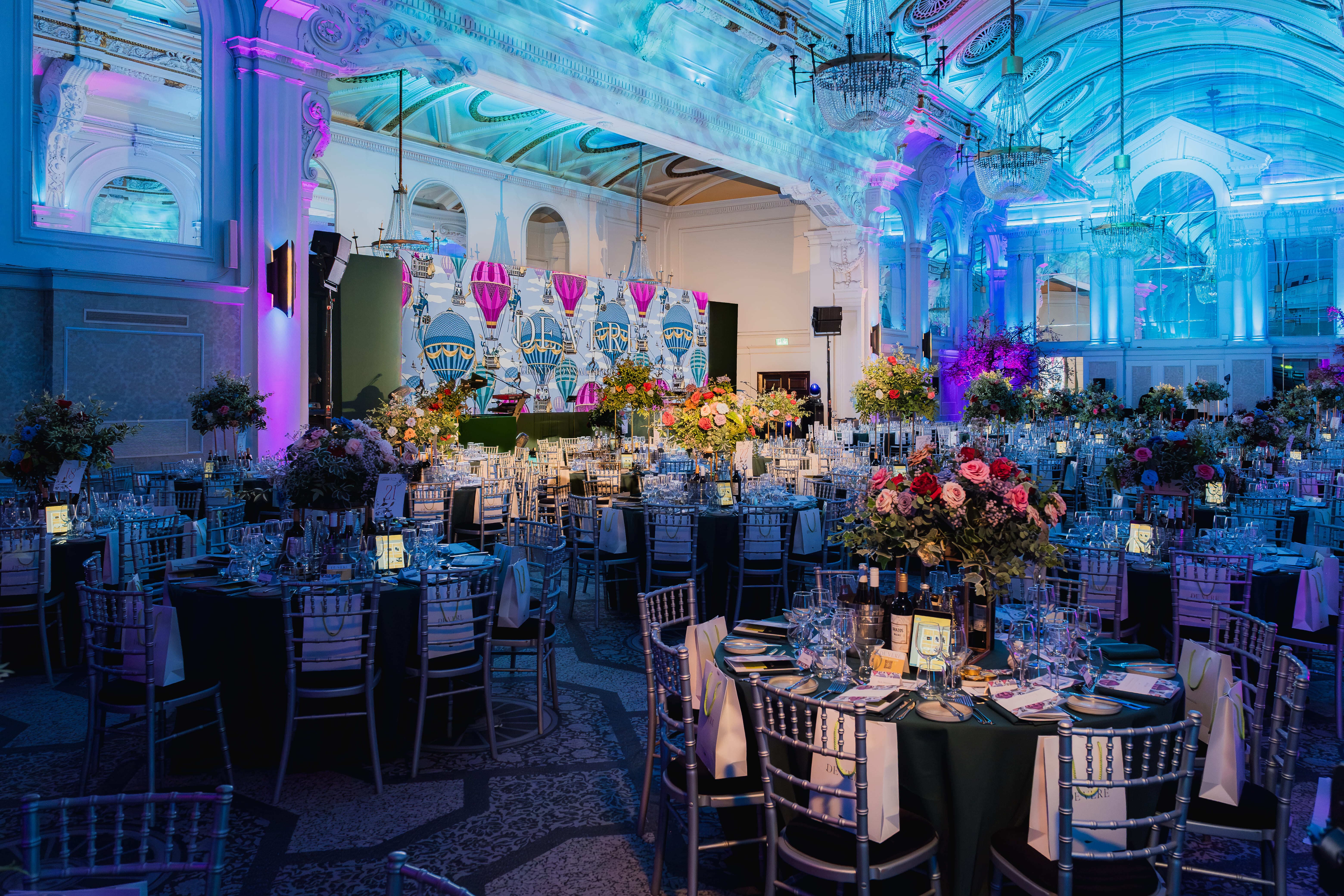 Grand Connaught Rooms gala with elegant floral centerpieces for corporate events and luxury galas.