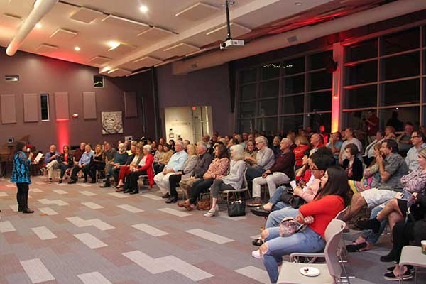 Audience engaged in modern auditorium event at Spring Hill Event Center.