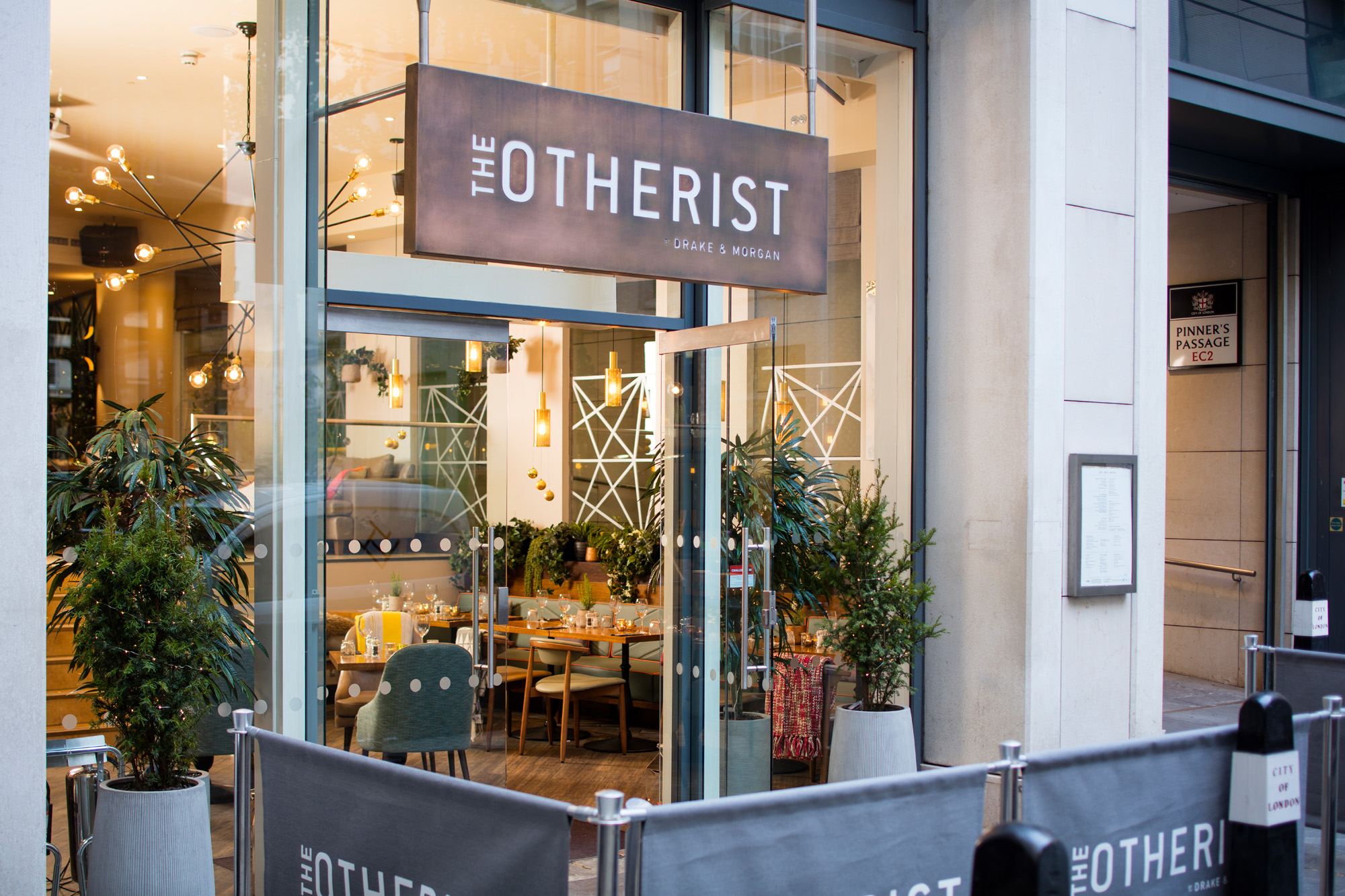 Stylish venue "The Otherist" with modern decor for intimate meetings and events.