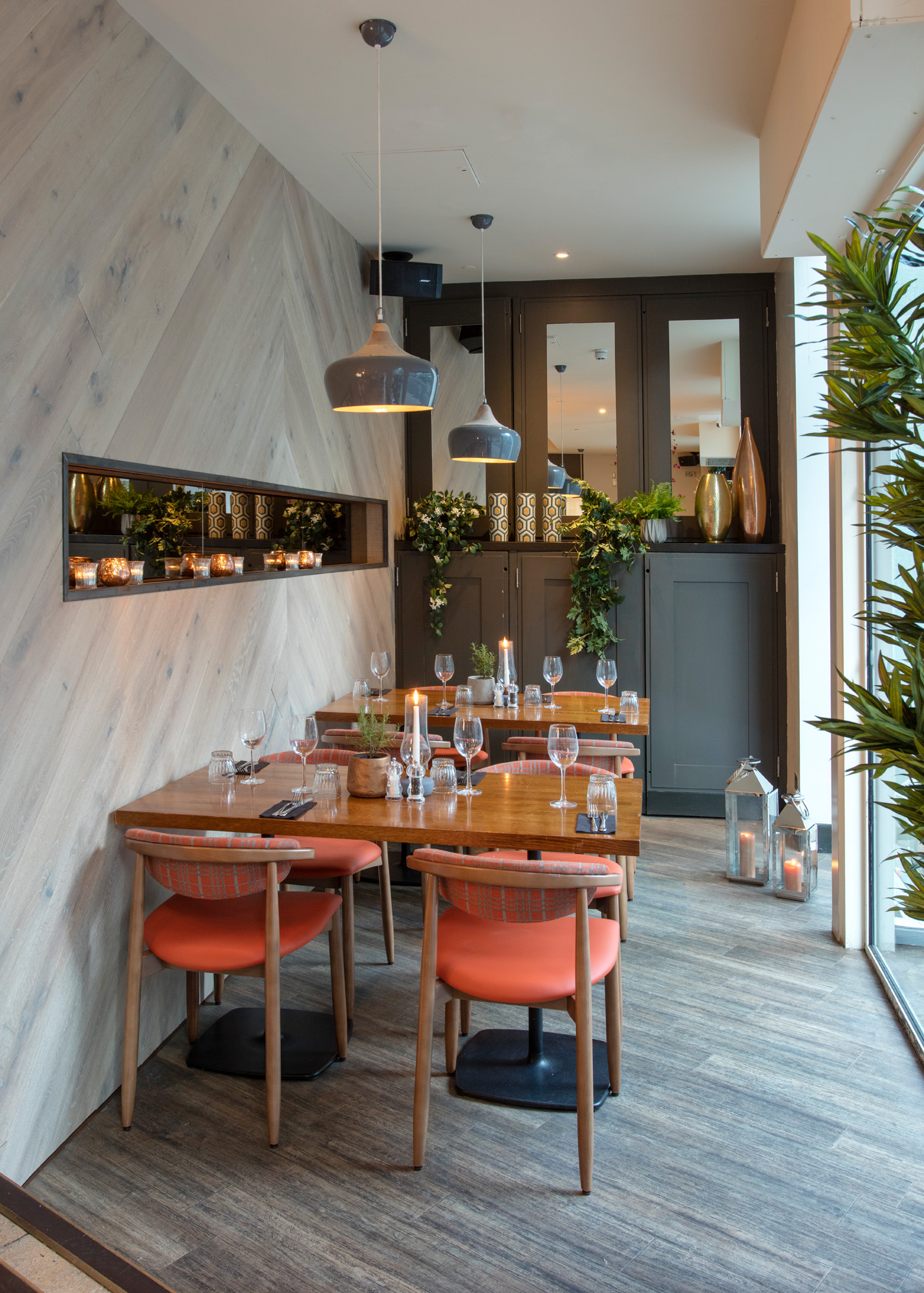 Stylish dining area with warm lighting for intimate gatherings and corporate events.