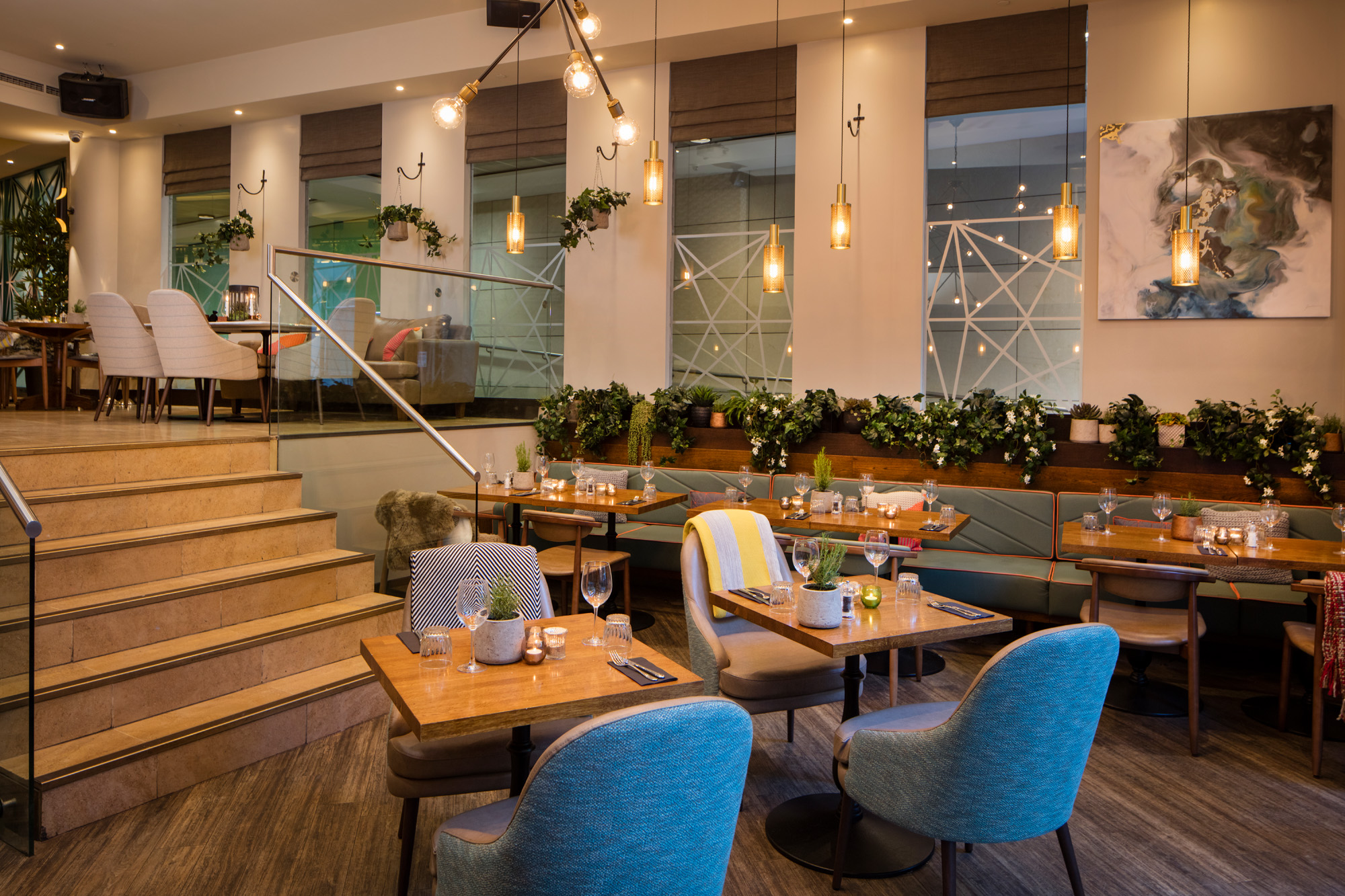 Stylish dining venue with warm lighting, perfect for intimate meetings and events.
