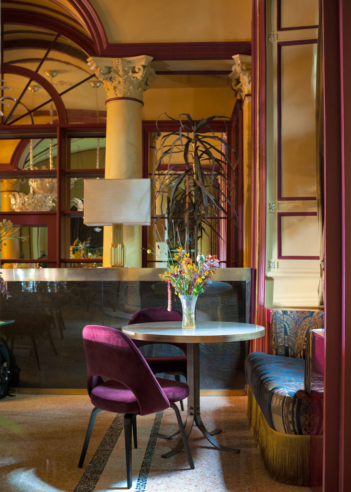 Caruso Nuovo Bistrot seating area, elegant decor for informal meetings and networking.