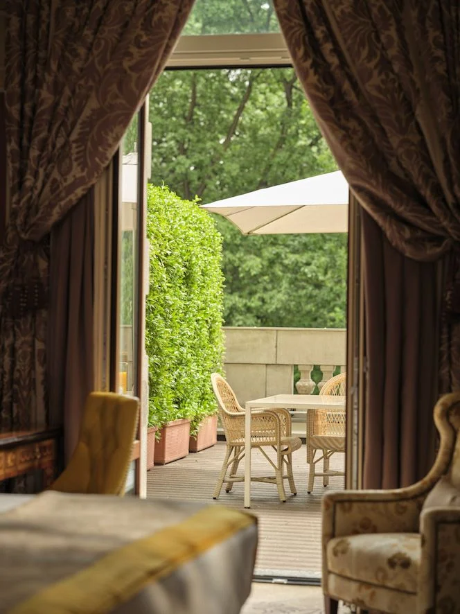 Serene outdoor Veranda at Hotel Principe di Savoia for intimate gatherings and meetings.