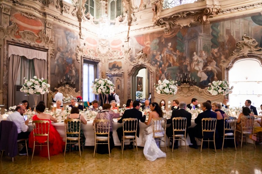 Elegant wedding venue with floral centerpieces in Palazzo Visconti. Perfect for galas.