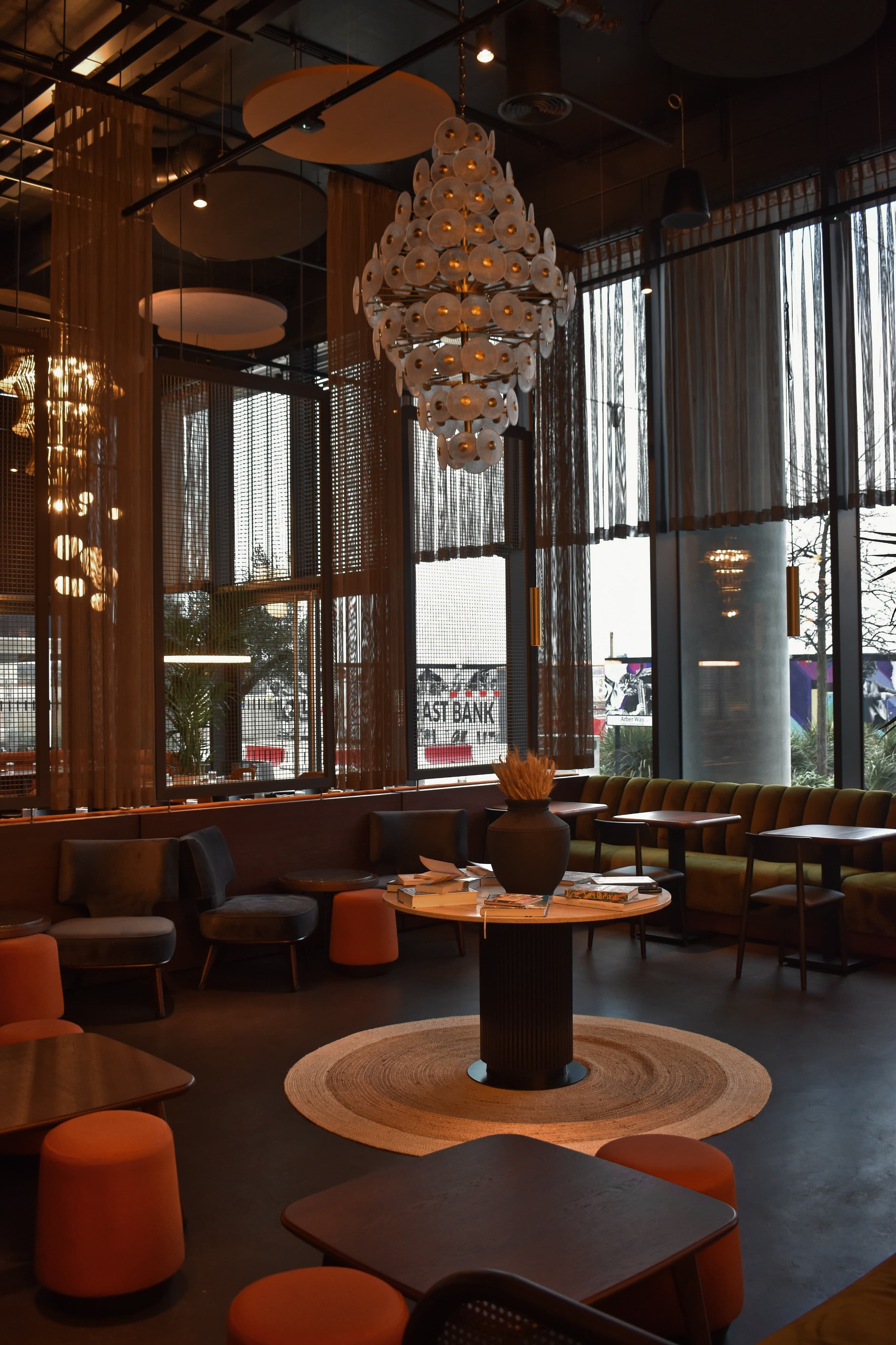 Elysium Lounge at HERA Restaurant: modern event space with natural light for gatherings.