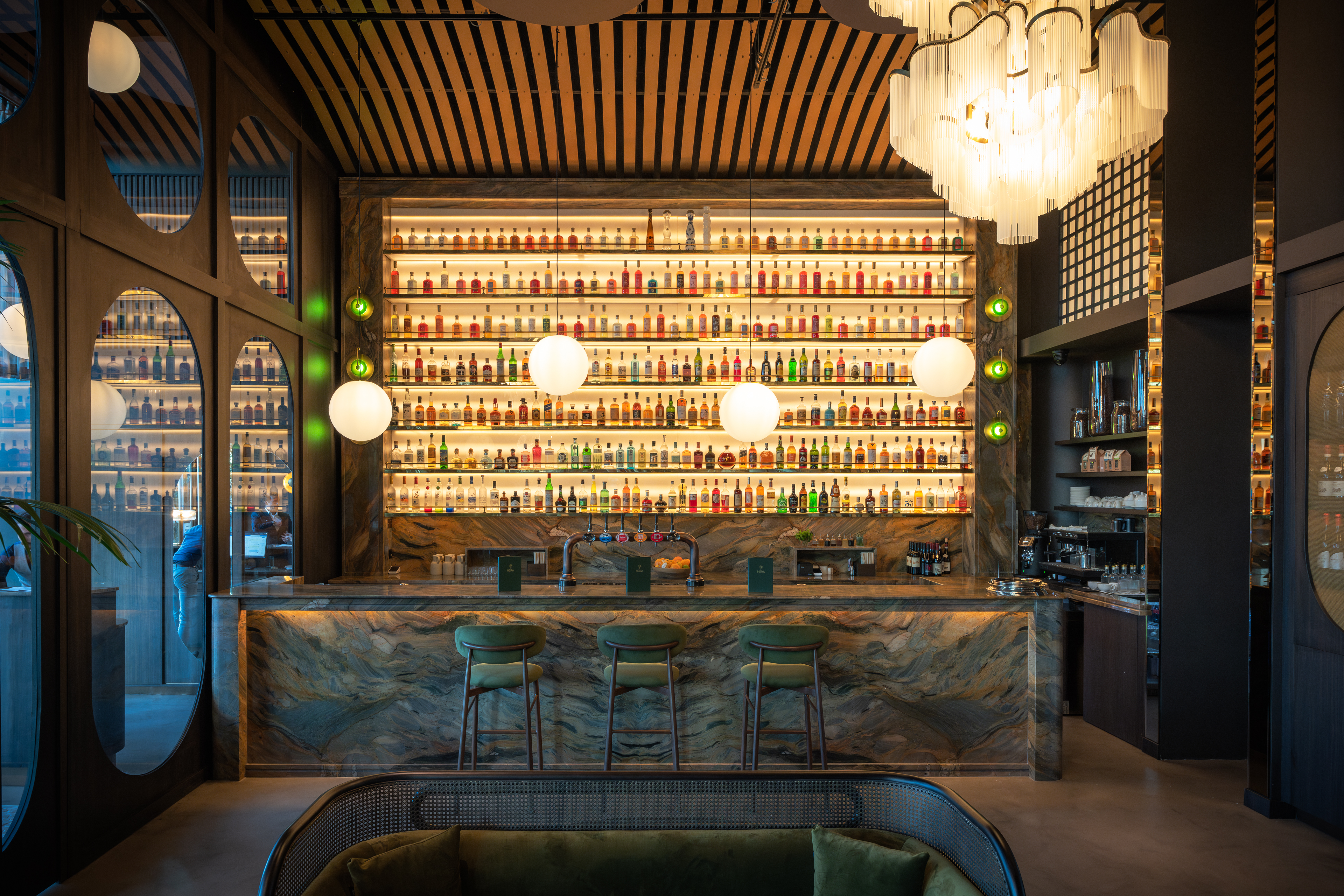 Stylish bar at HERA Restaurant, perfect for networking events and cocktail receptions.