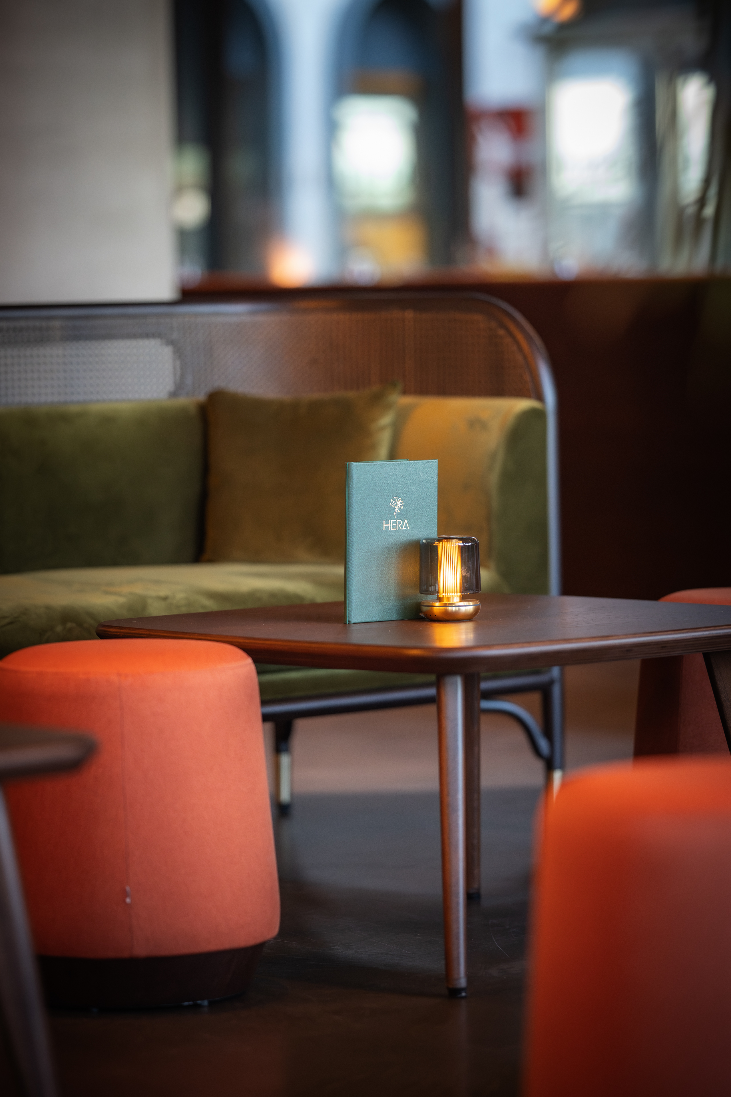 Elysium Lounge at HERA Restaurant with plush seating, ideal for networking events.