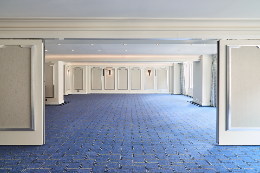 Versatile event space at Claridge's, ideal for meetings and conferences with natural light.