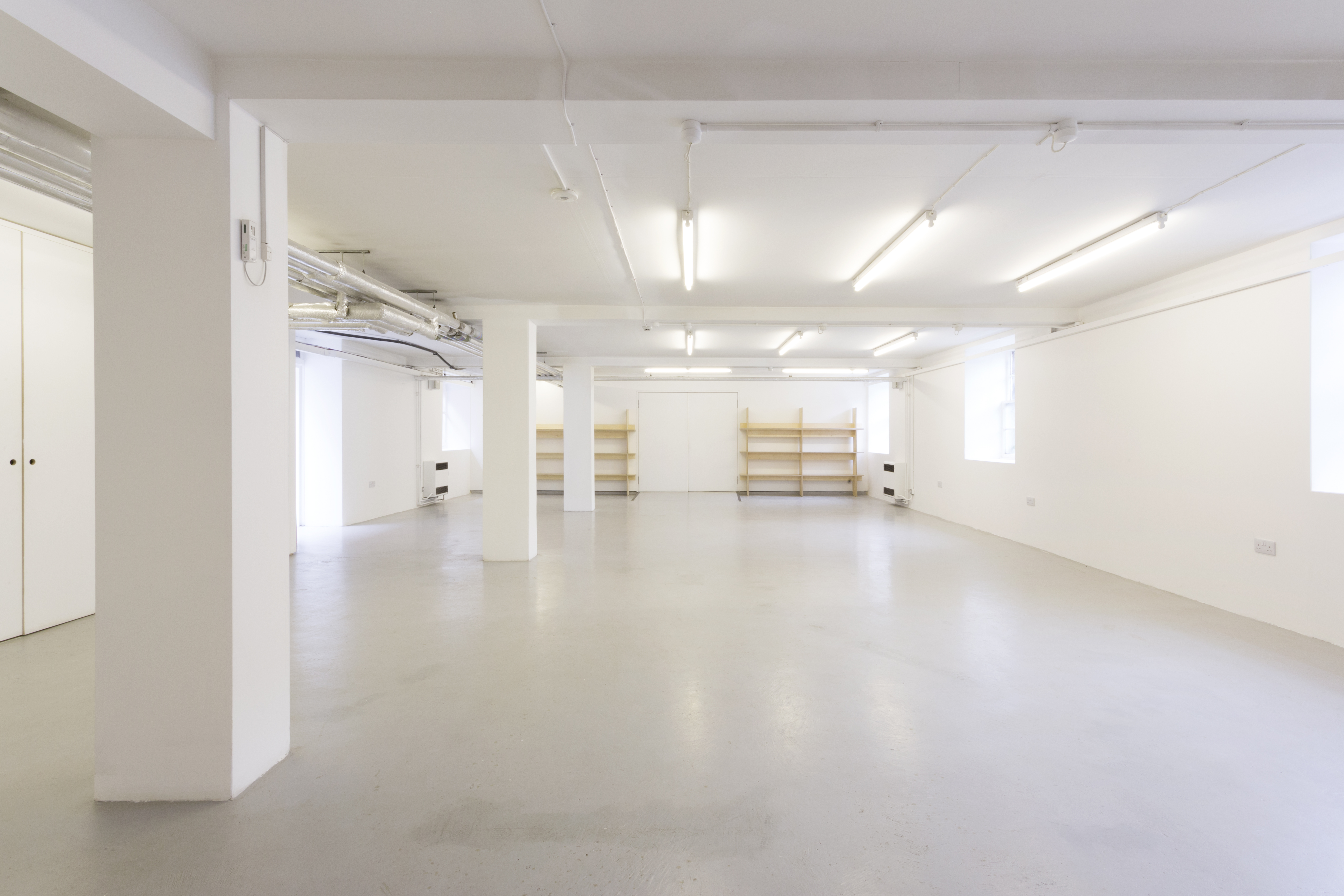 Event Space in Custom Lane: versatile venue with neutral decor for meetings and events.