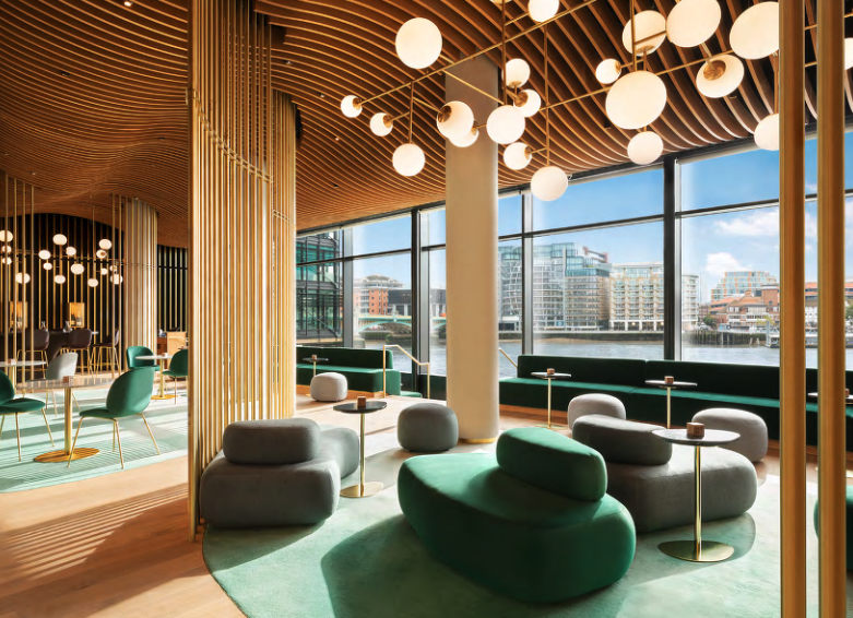 Modern meeting space with unique lighting at Hithe + Seek Bar & Kitchen, ideal for networking.