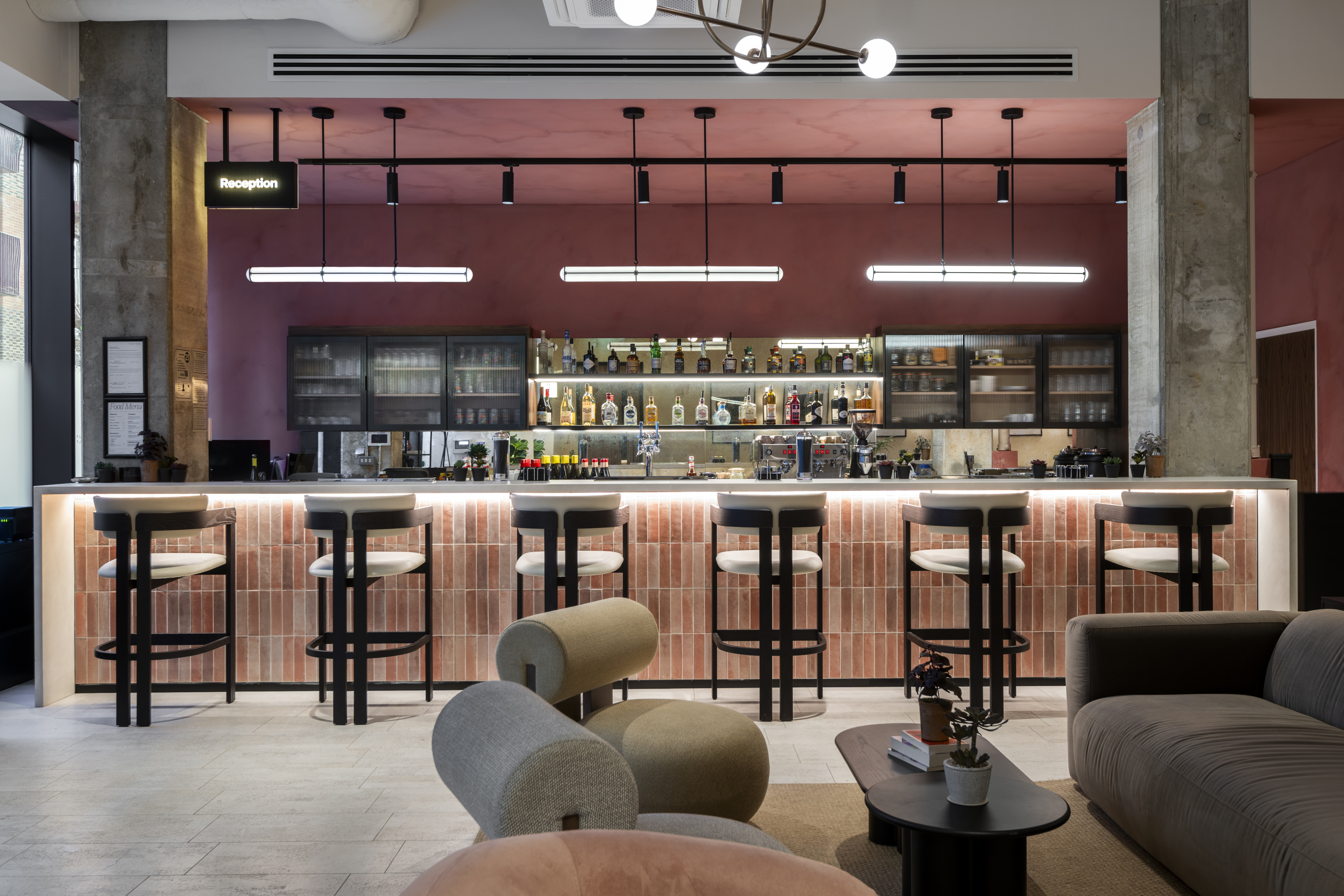 Modern bar area in Qube Elephant Lounge, ideal for networking events and casual meetings.