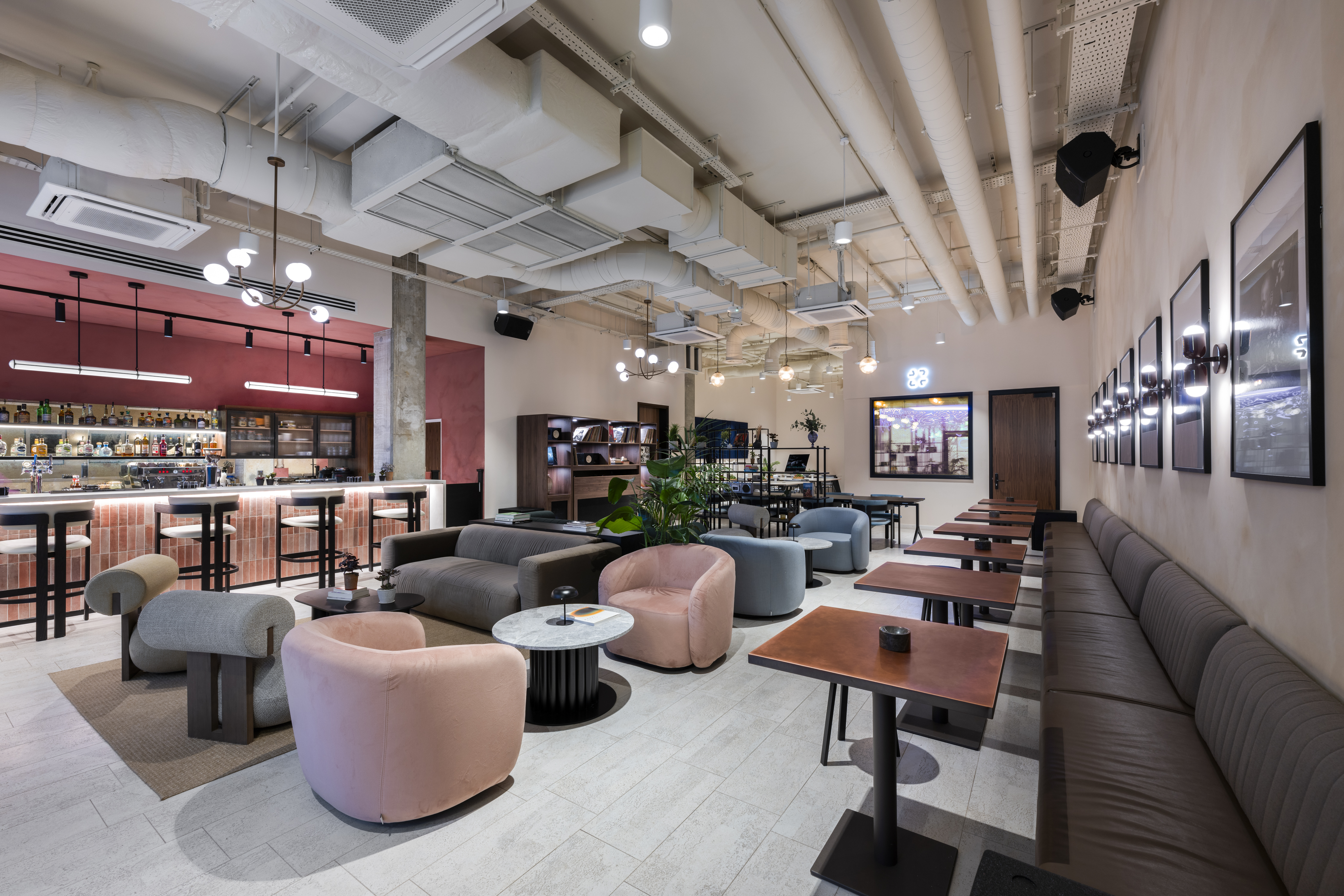 Modern event space at Qube Elephant Lounge & Bar with stylish seating for meetings.