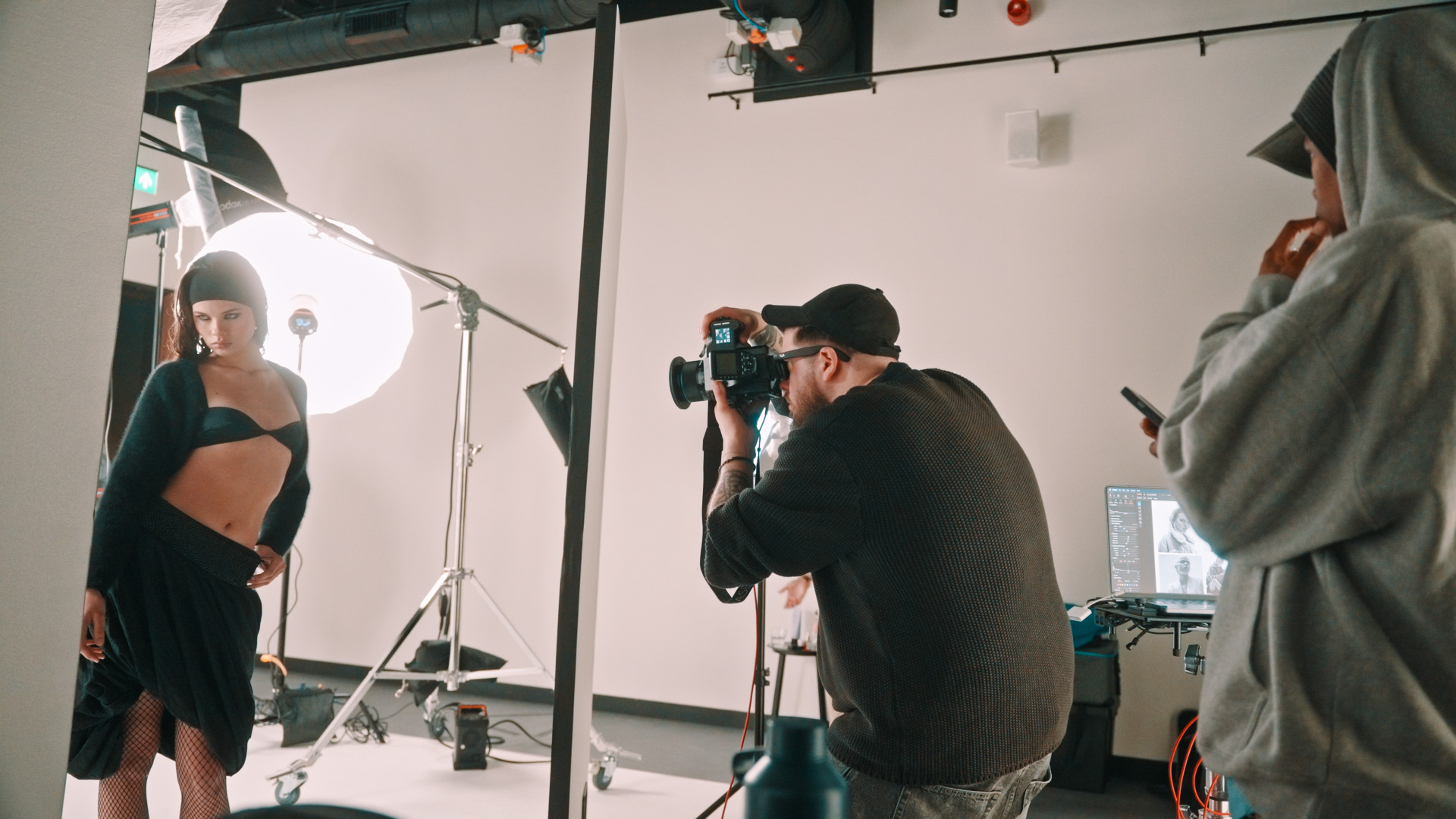 Dynamic photoshoot at Qube Elephant Lounge with professional lighting setup for events.