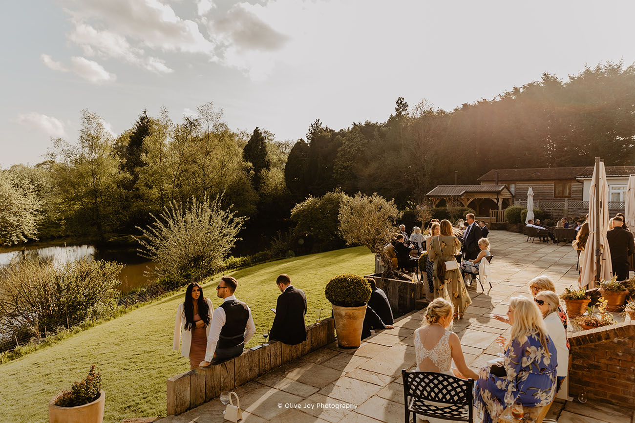 Outdoor garden venue at Brookfield Barn with lush greenery, ideal for weddings and events.