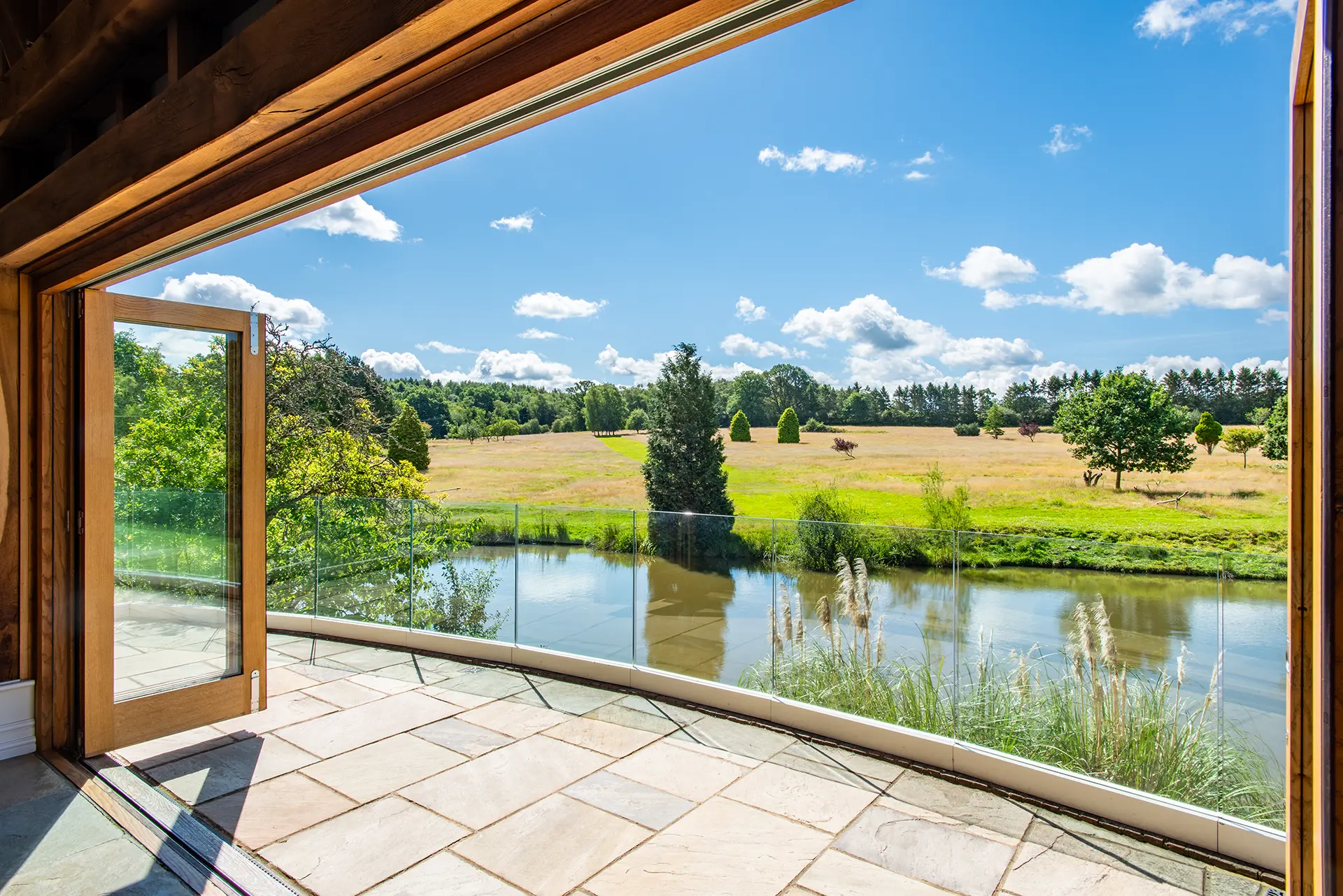 Outdoor garden venue at Brookfield Barn with lush greenery, ideal for events and retreats.