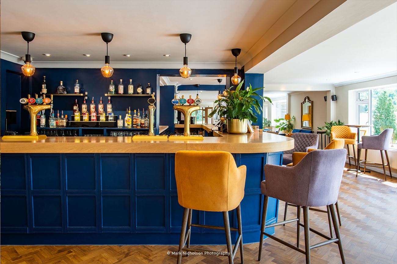 Stylish bar area in Brookfield Barn, ideal for networking events and cocktail receptions.