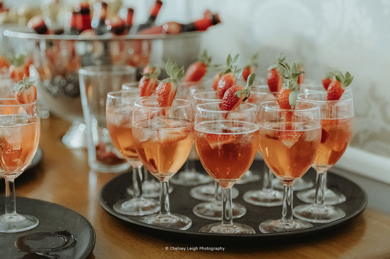 Elegant cocktails with strawberries in The River Room, perfect for receptions and gatherings.