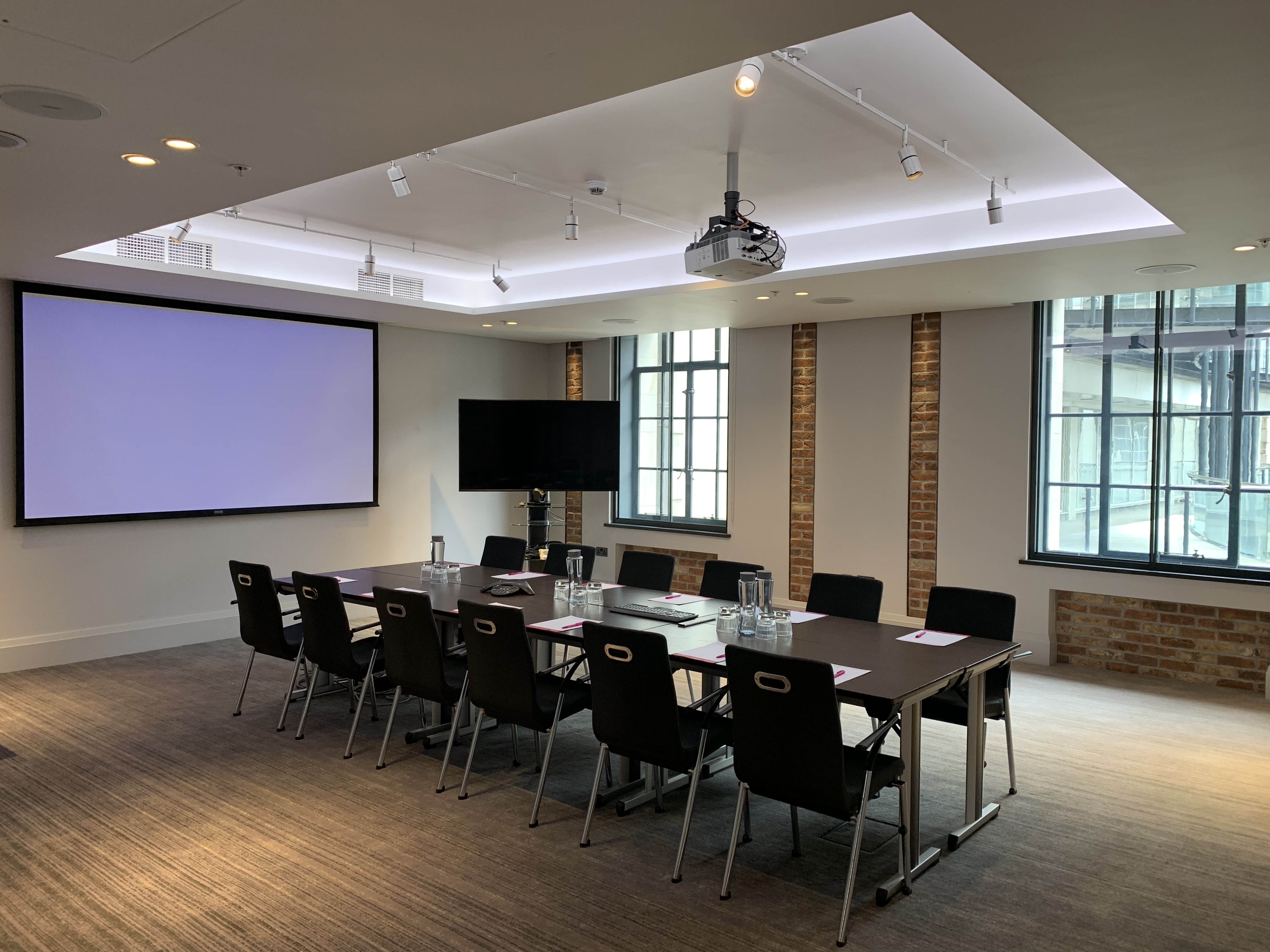 Modern meeting room at etc.venues County Hall, ideal for collaborative events and presentations.