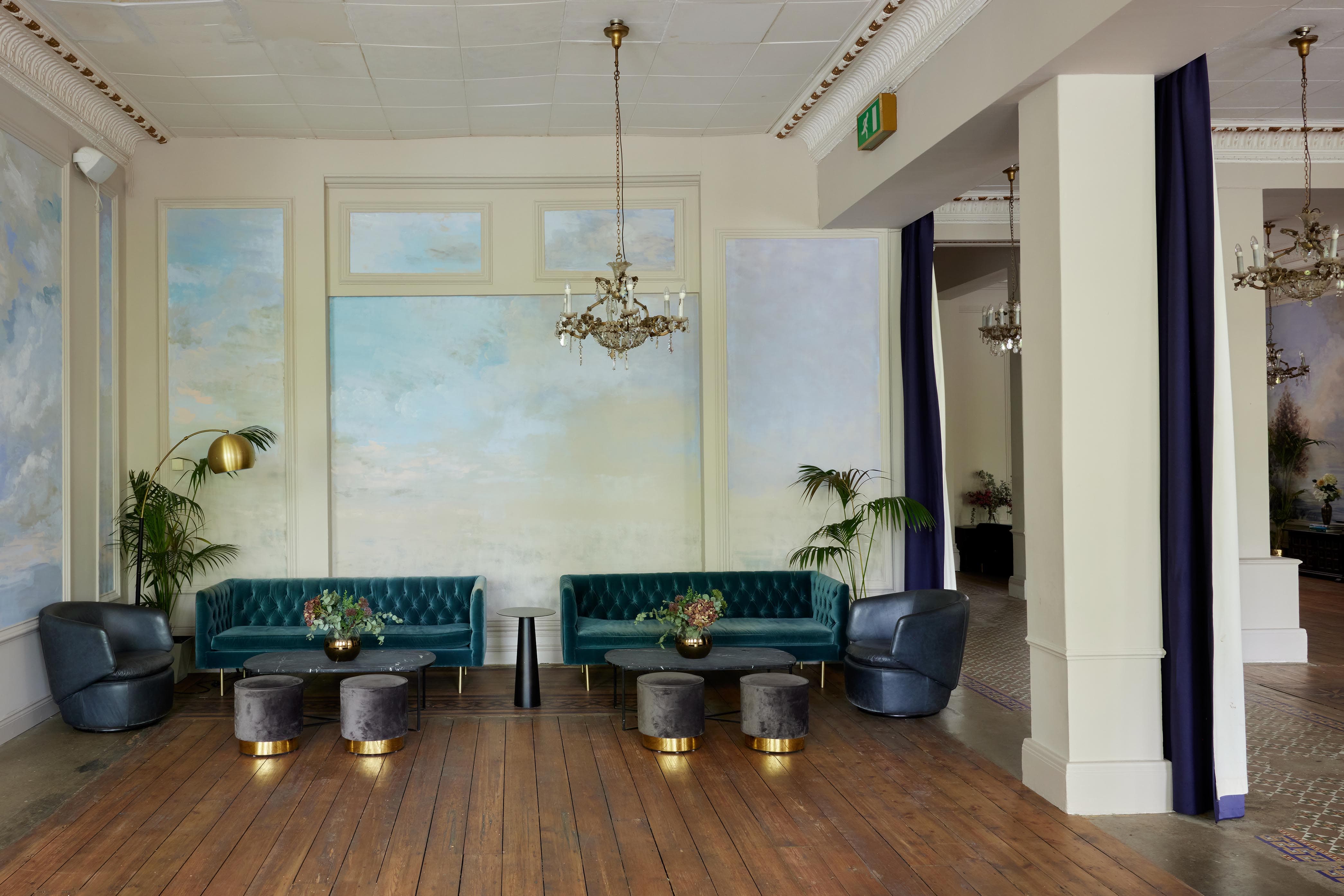 Stylish Bayswater Suite with teal sofas for meetings and events in The Columbia.