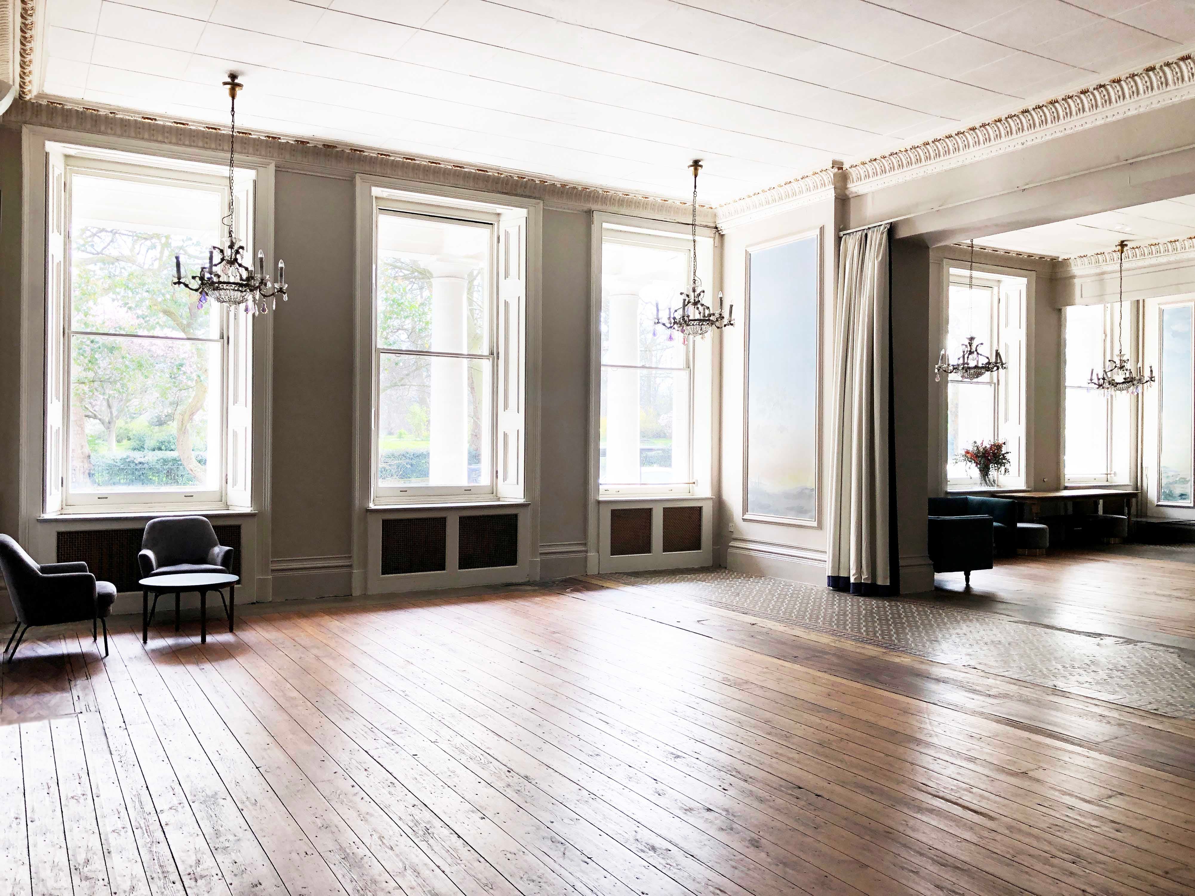 Elegant Bayswater Suite venue with large windows for meetings and receptions.