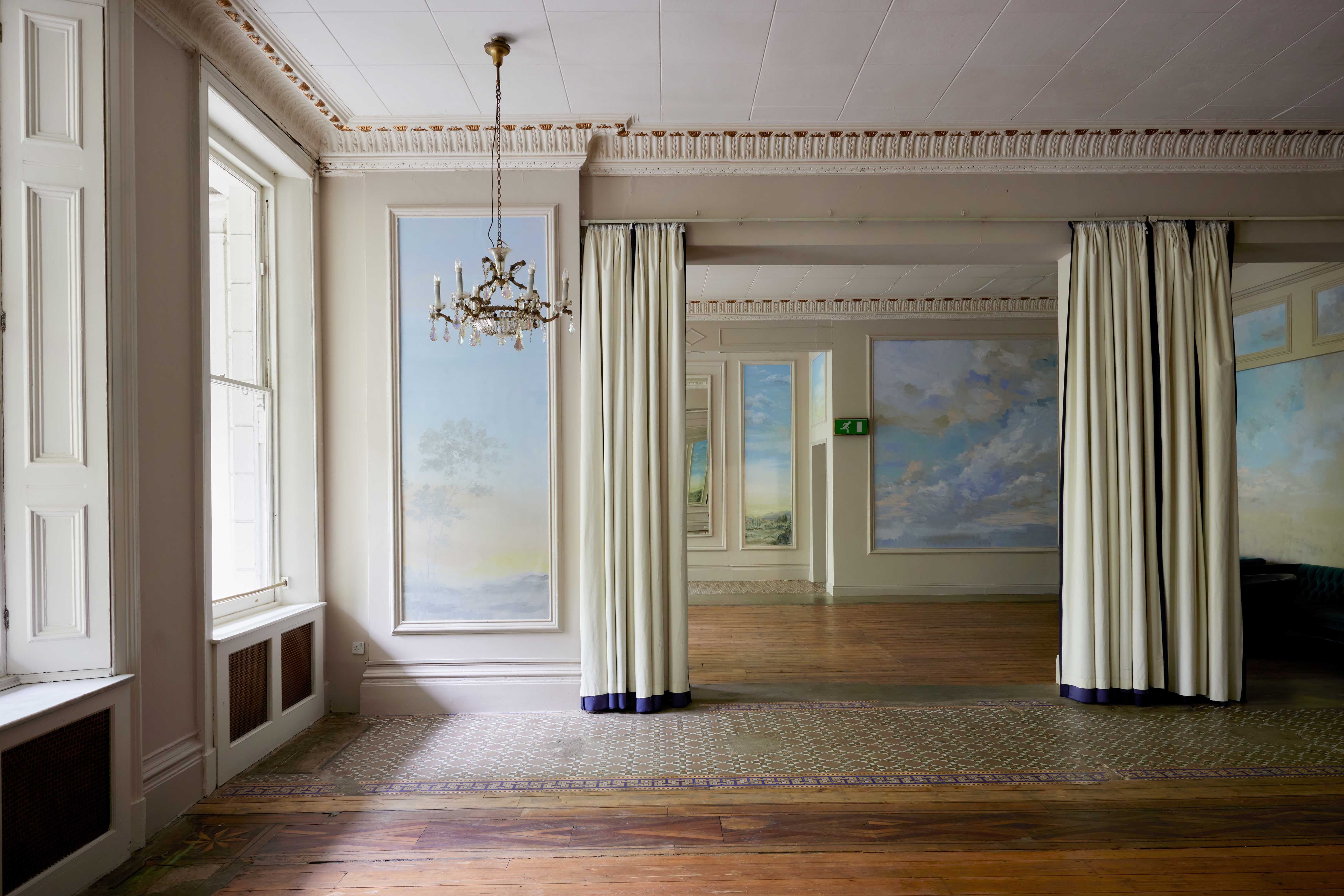 Bayswater Suite at The Columbia: spacious room with large windows for events and gatherings.